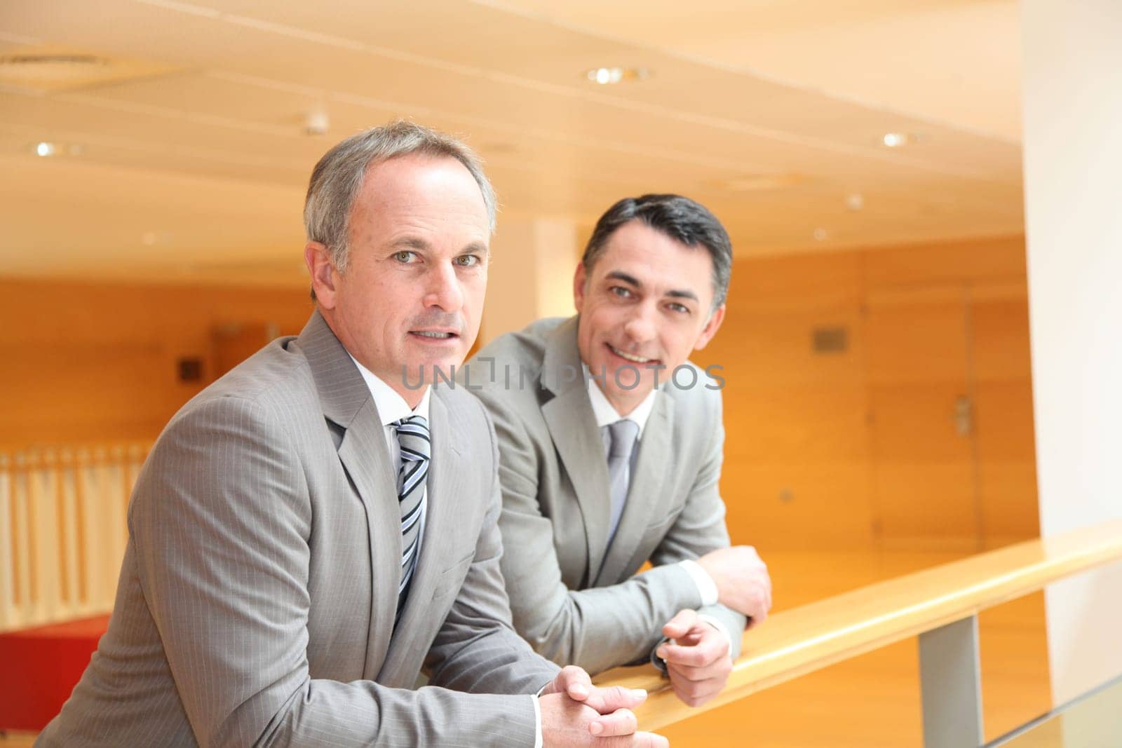 Business partners meeting in lobby