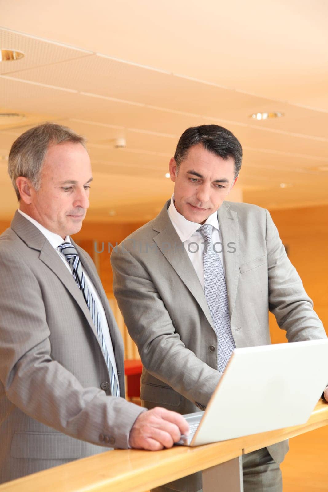 Business partners meeting in lobby
