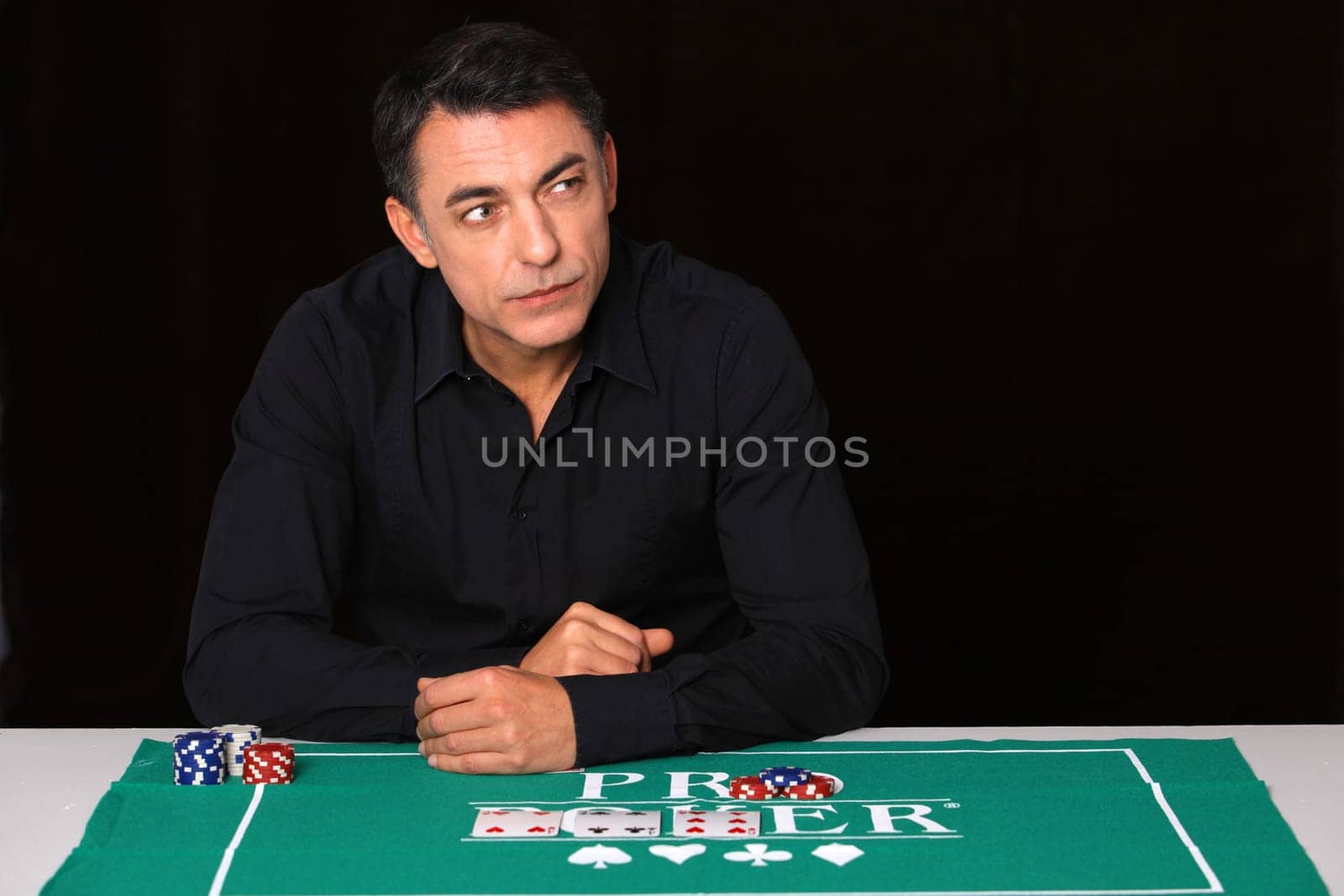 Man sitting at poker table
