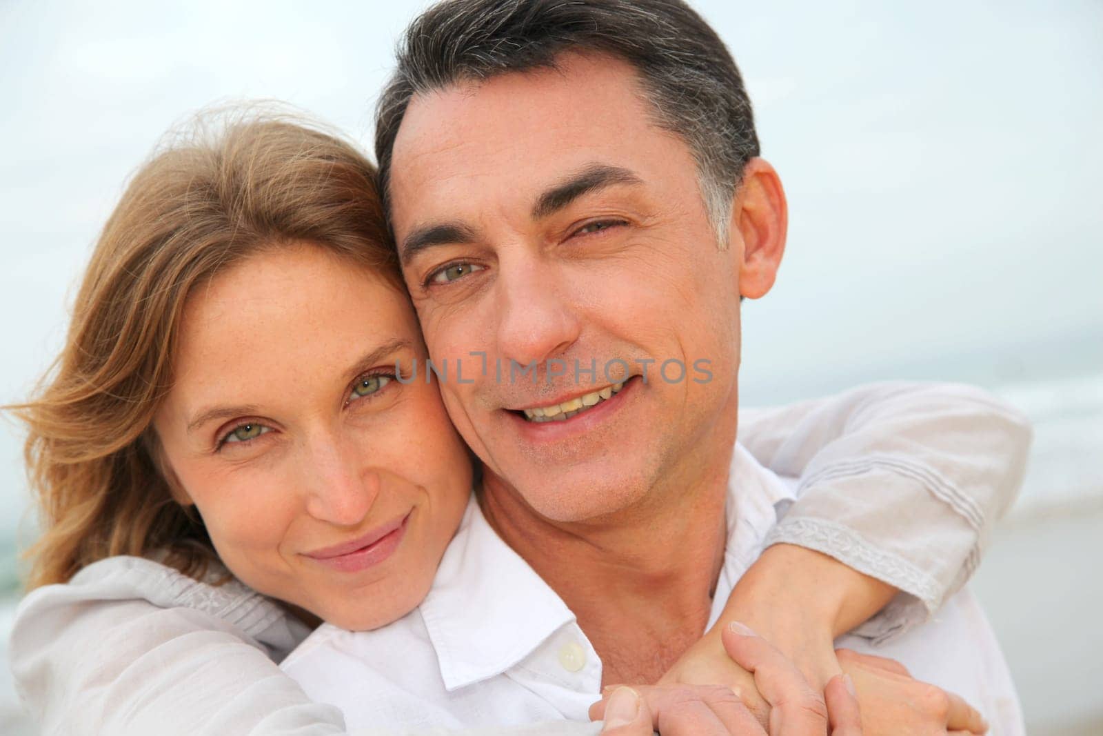 Couple embracing each other at the beach
