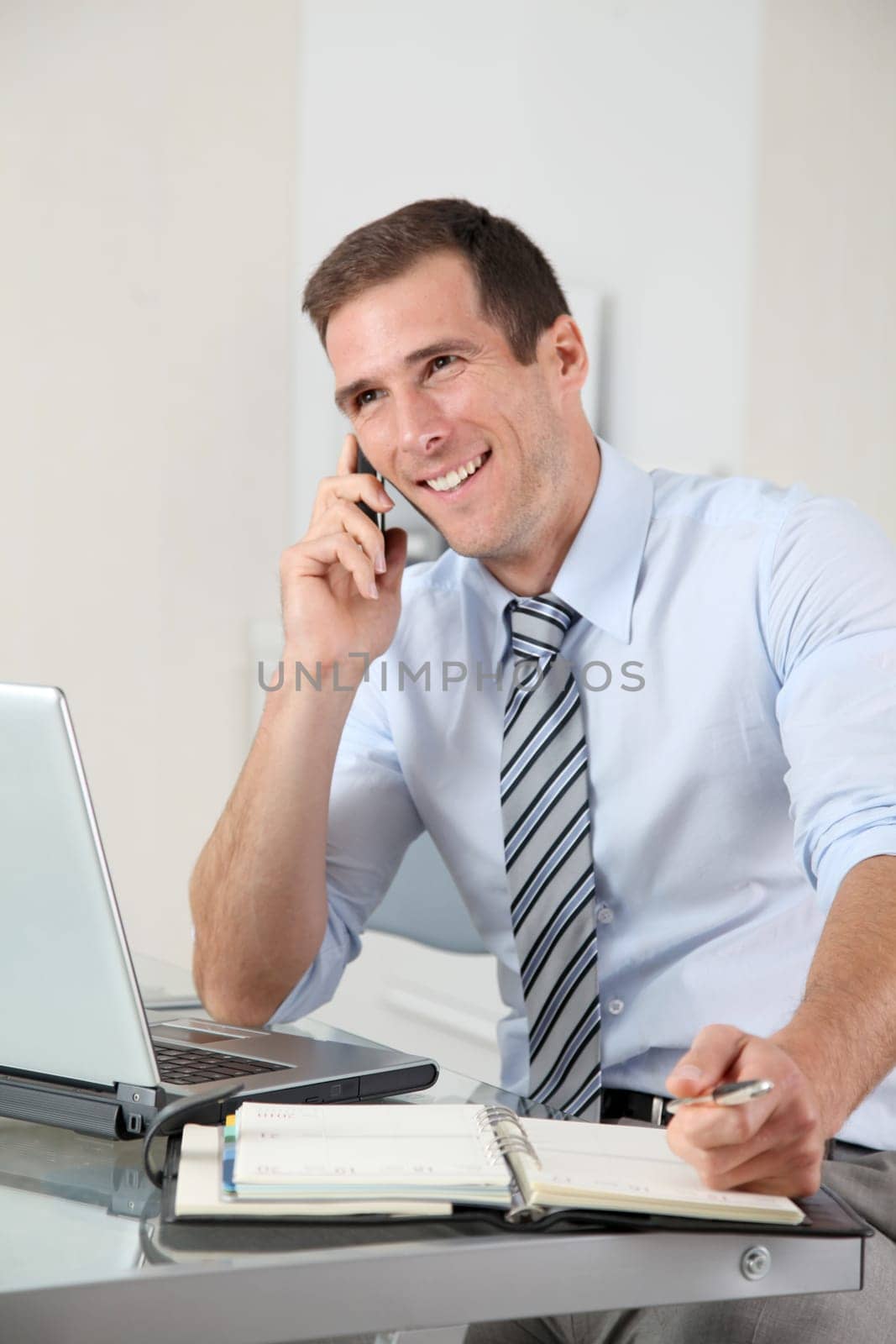 Man talking on the phone in the office