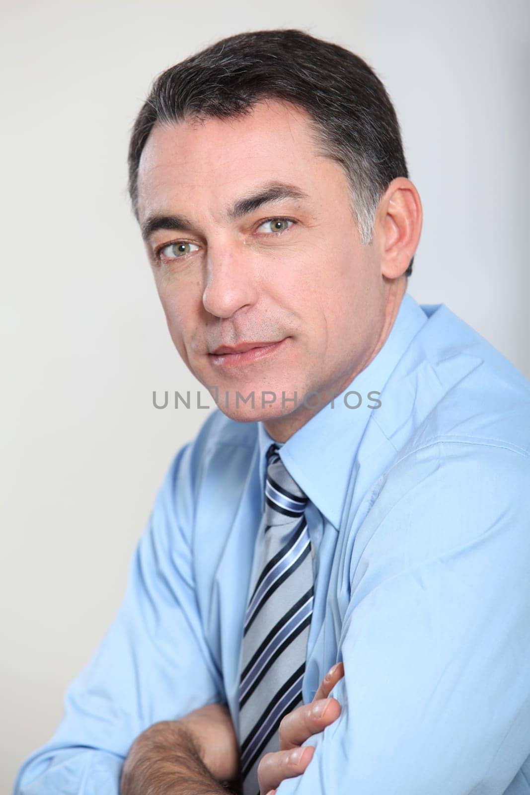 Closeup of businessman with blue shirt and tie