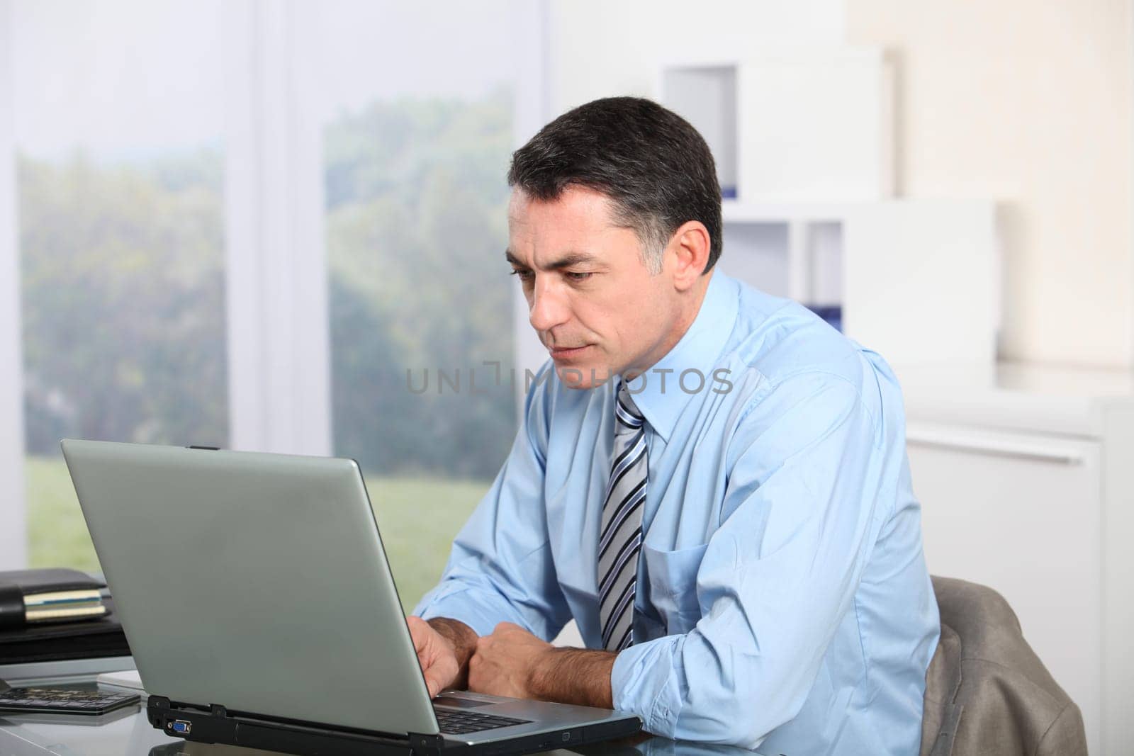 Businessman working on laptop computer