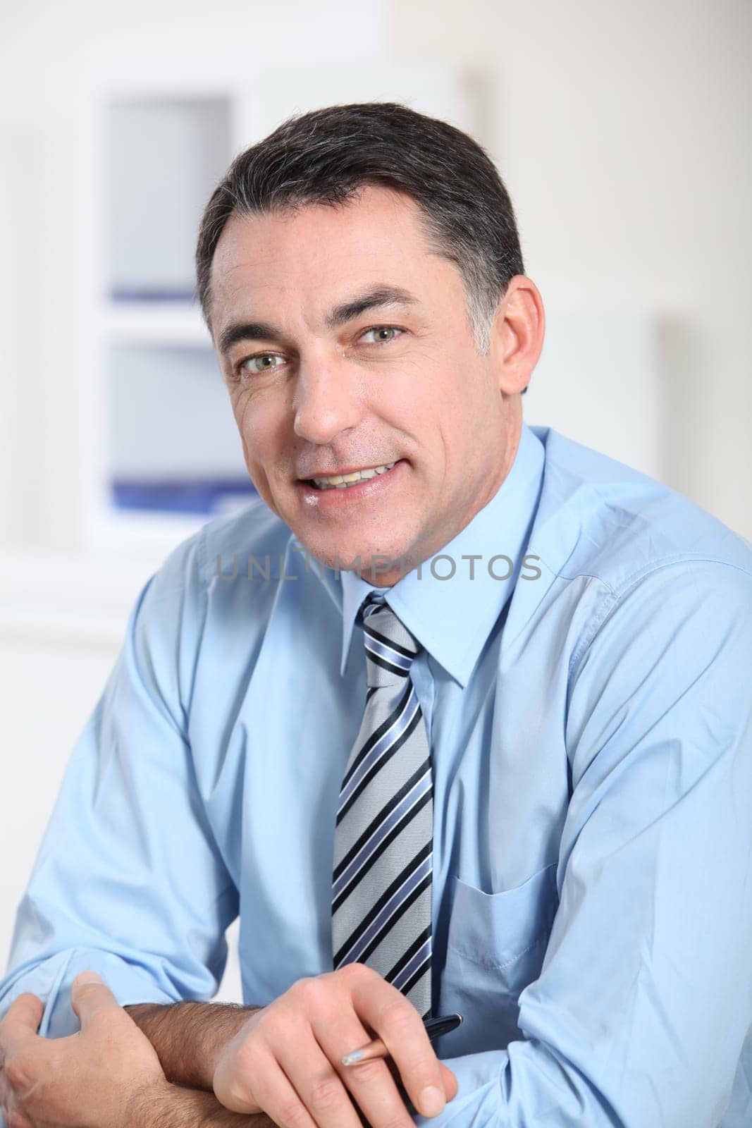 Closeup of smiling businessman