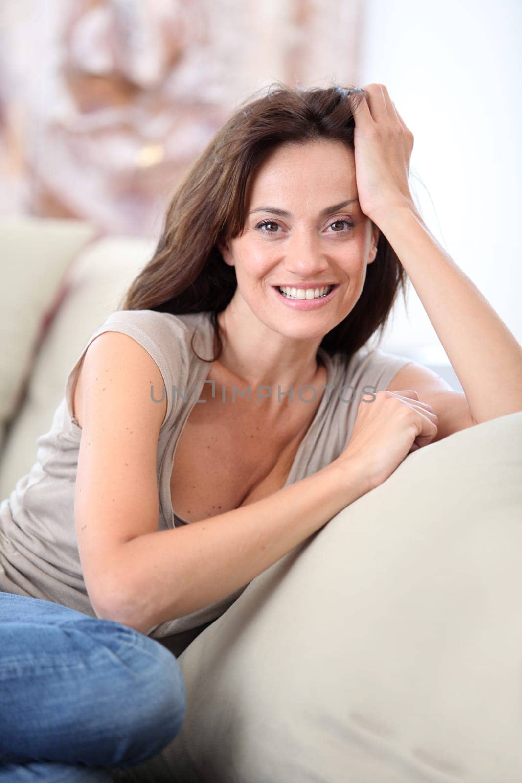 Closeup of beautiful woman relaxing at home