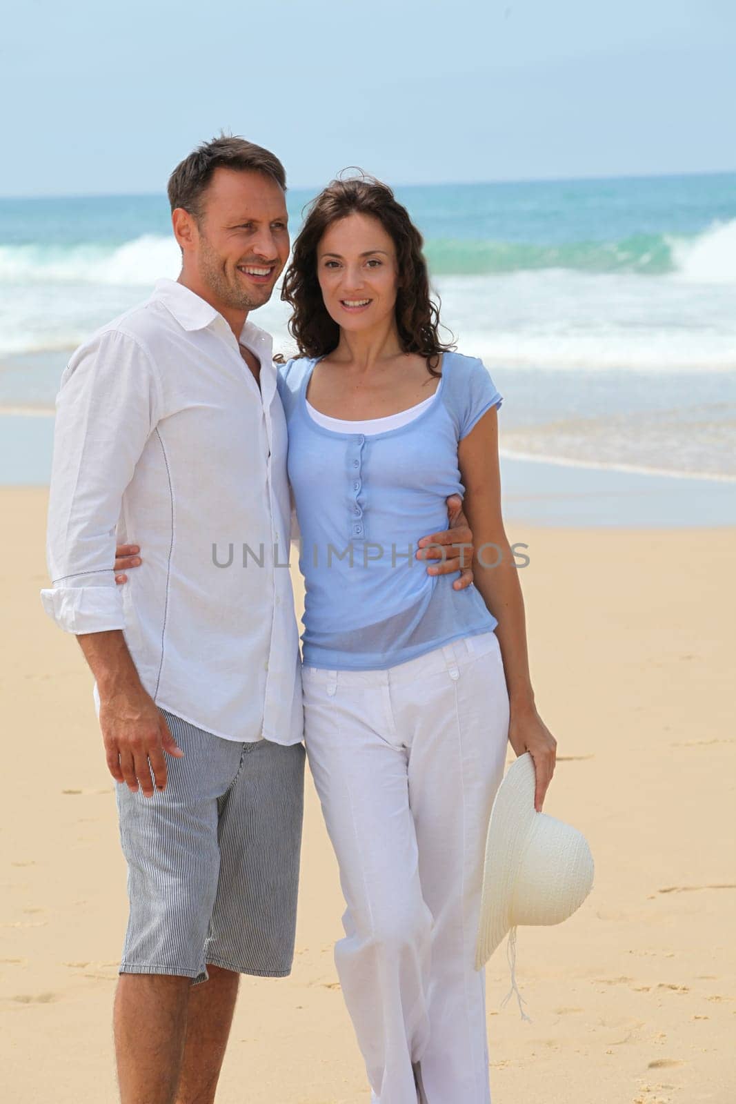 Couple walking on the beach