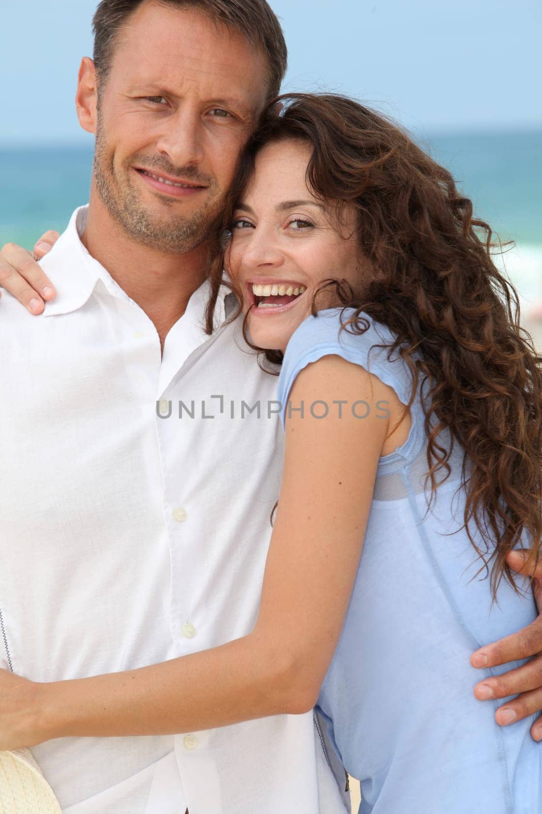 Couple walking on the beach