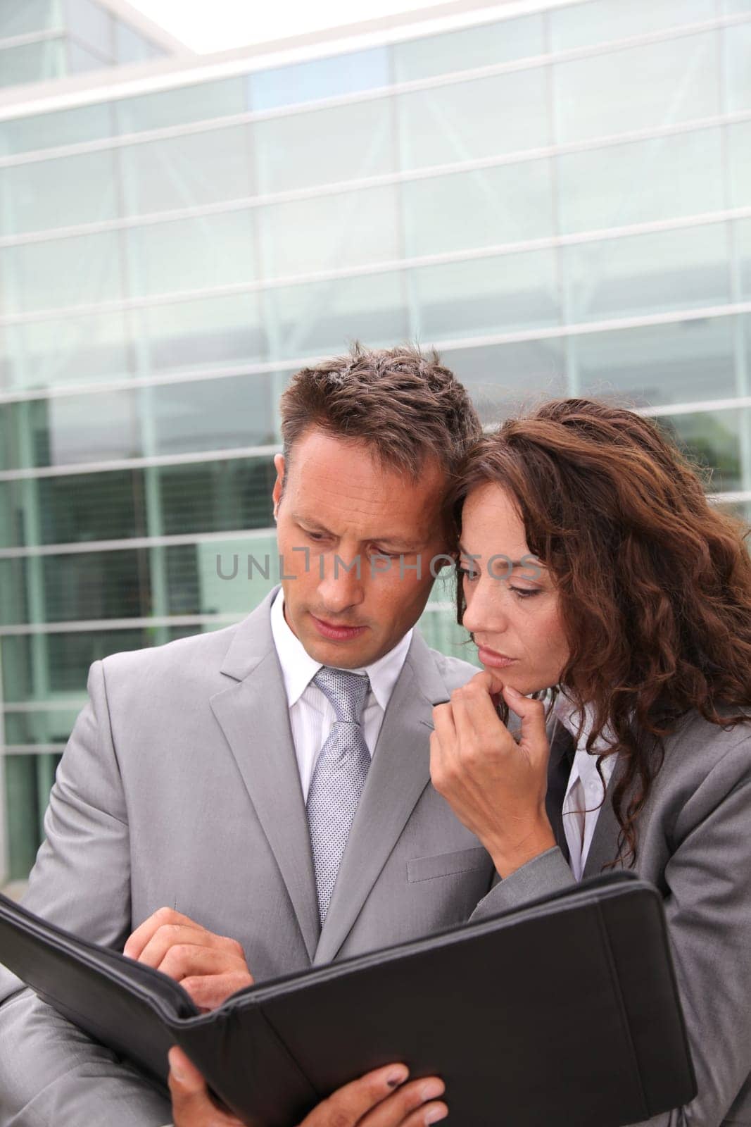 Business team meeting in front of building of offices