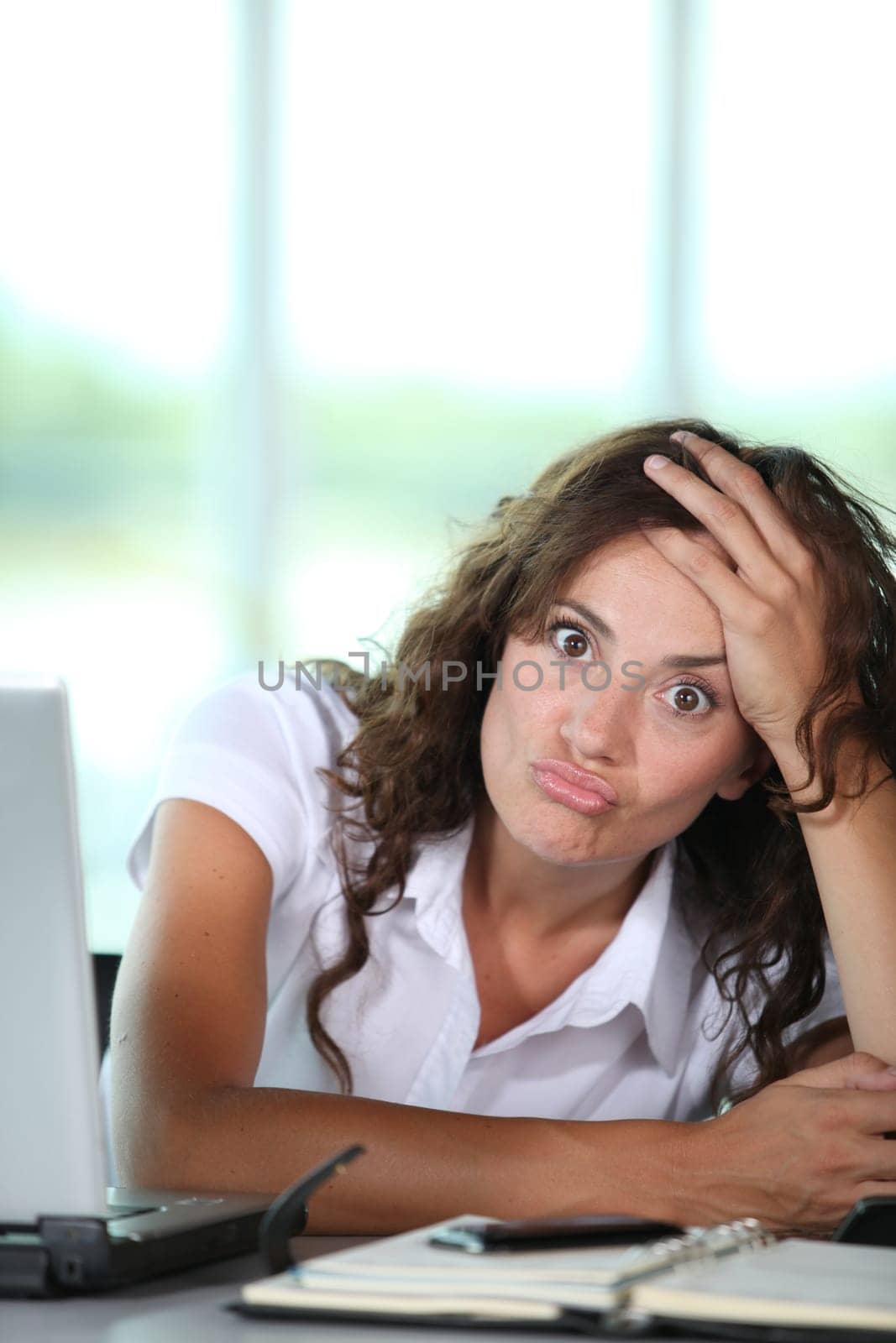 Bored businesswoman in the office