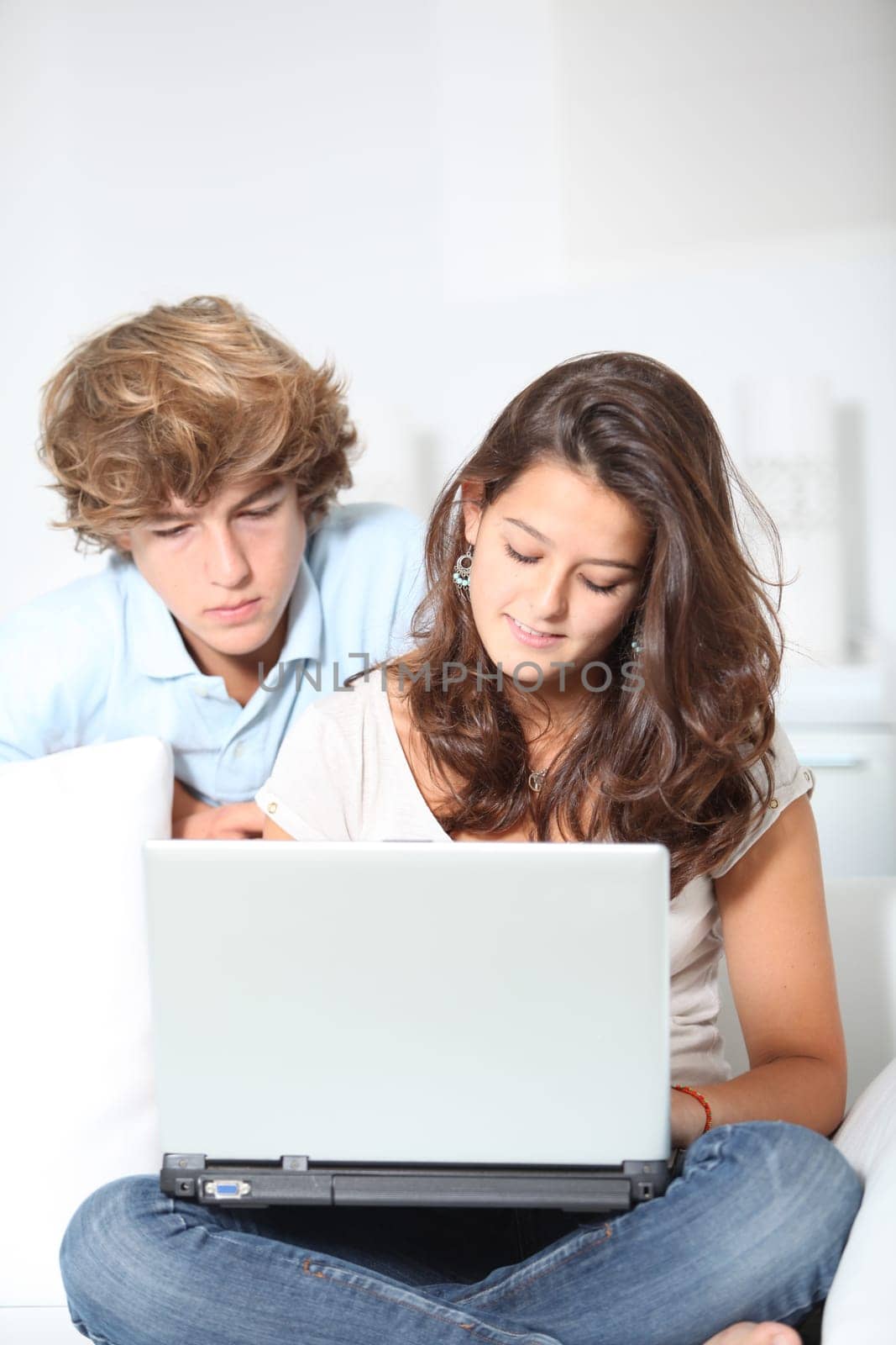 Teenagers with laptop computer