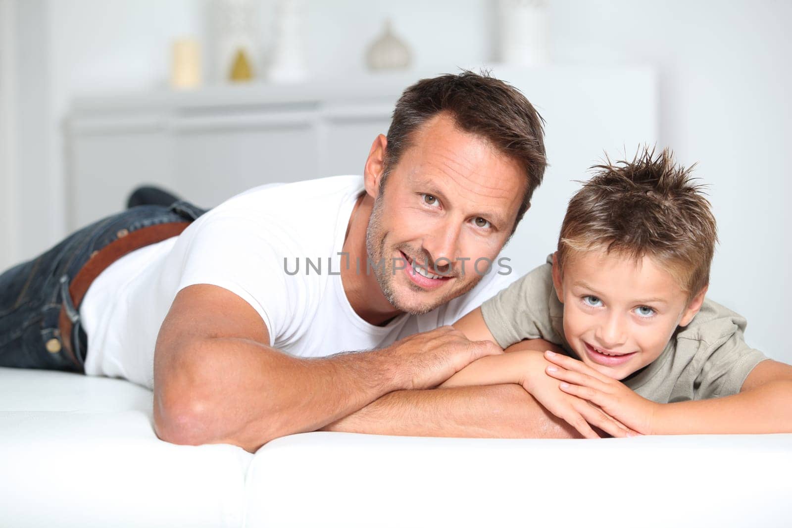 Closeup of father and son at home