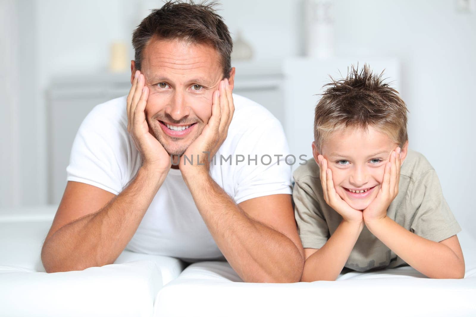 Closeup of father and son at home