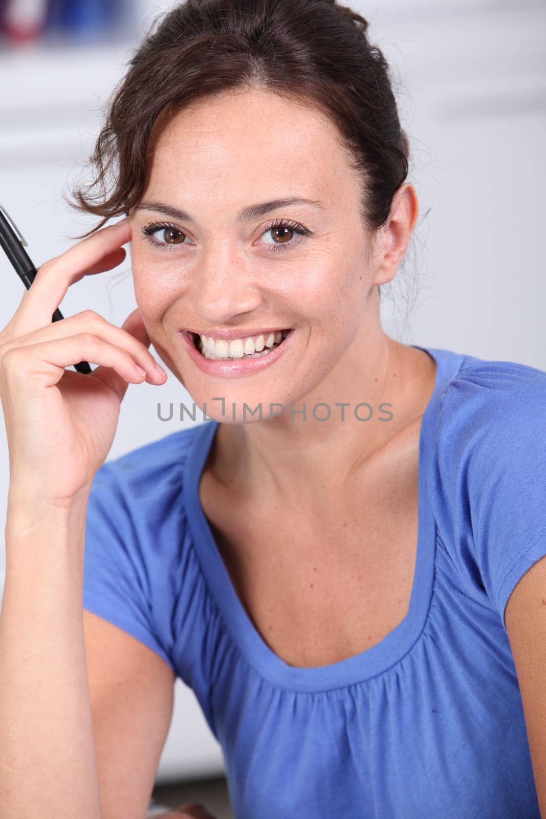 Closeup of beautiful woman with blue shirt