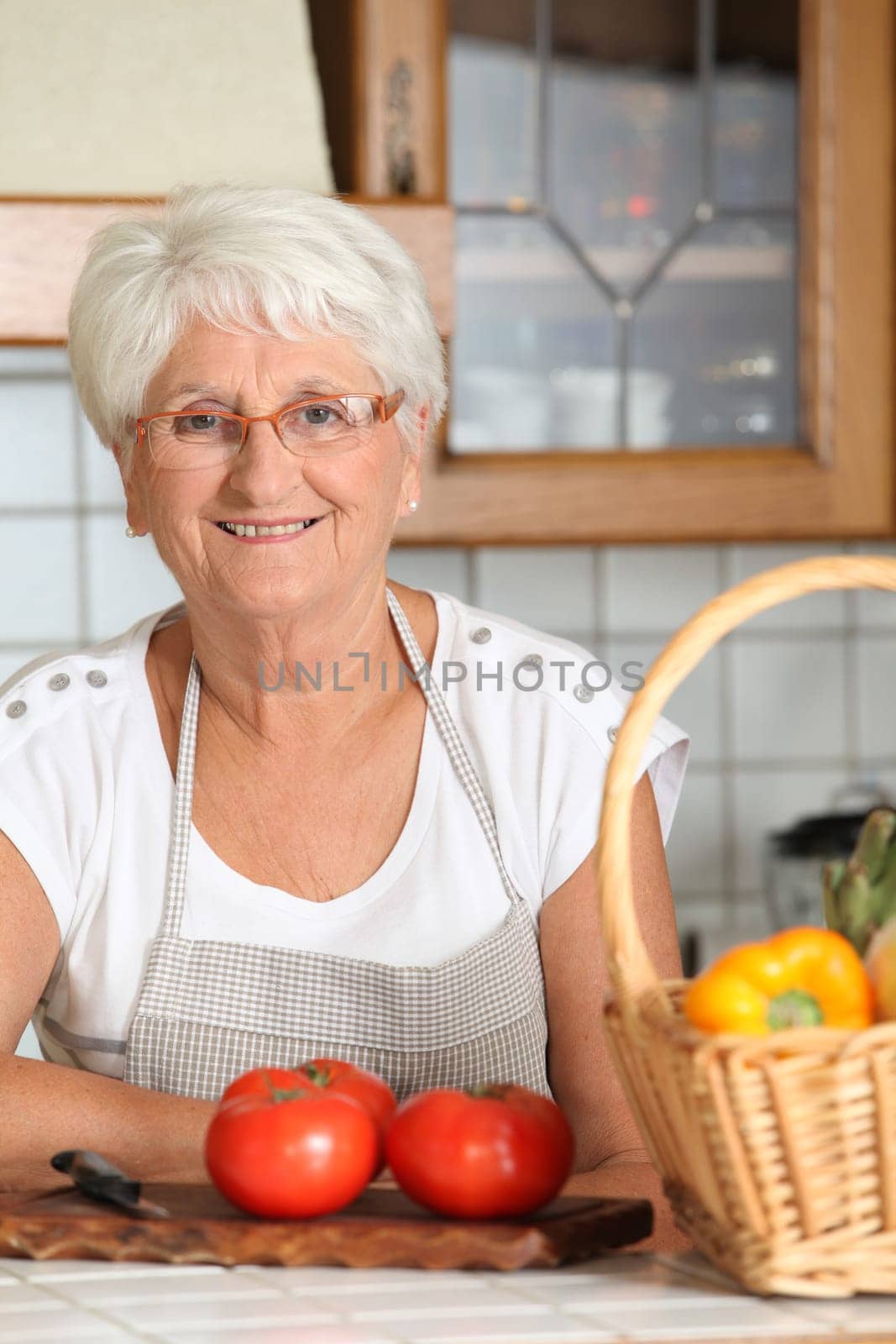 Elderly woman in kitchen