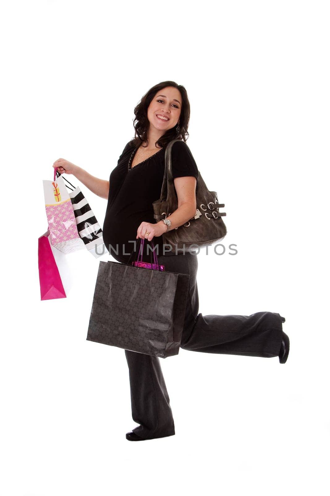 Pregnant woman with shopping bags
