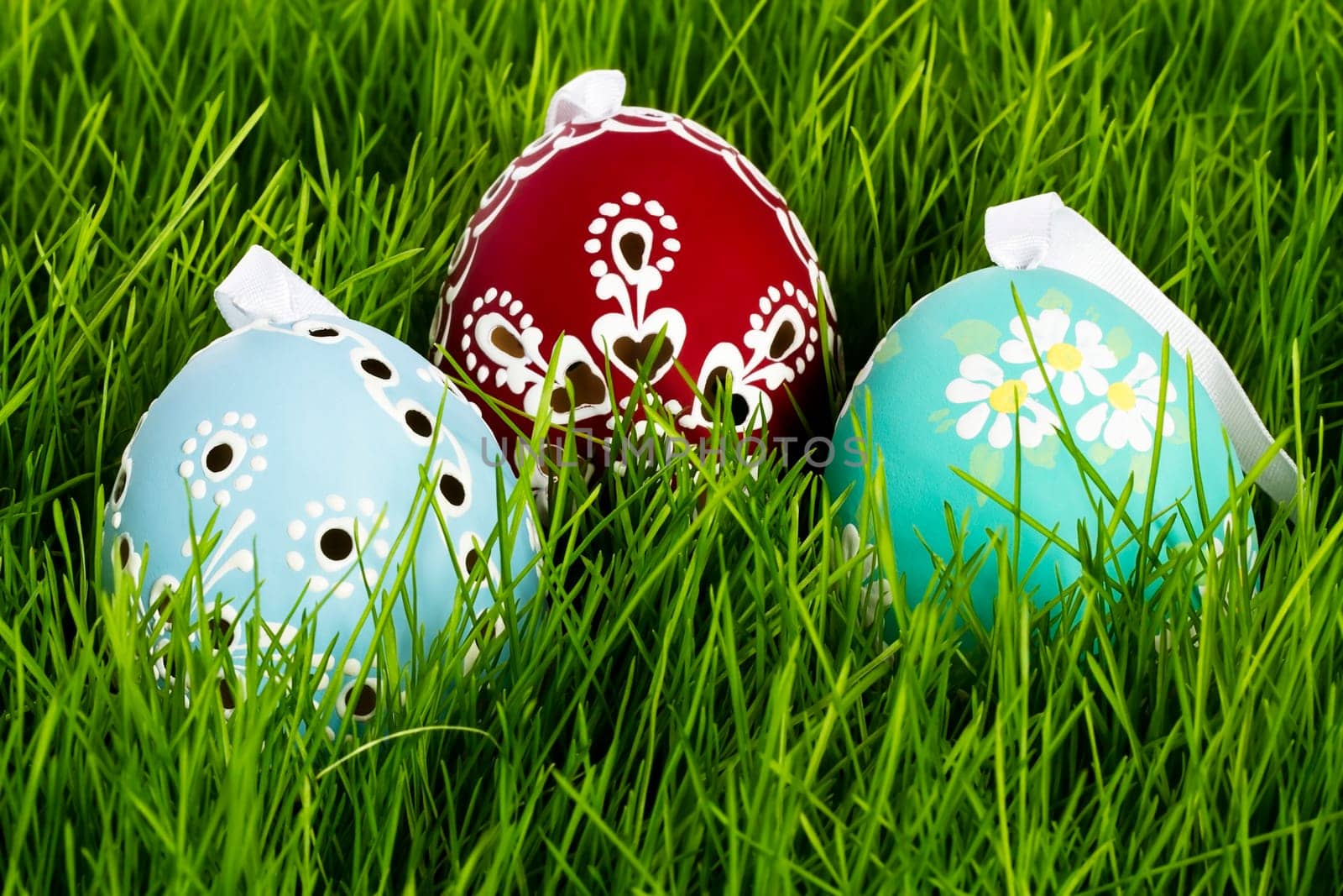 Three Hand Painted Easter Eggs in Grass