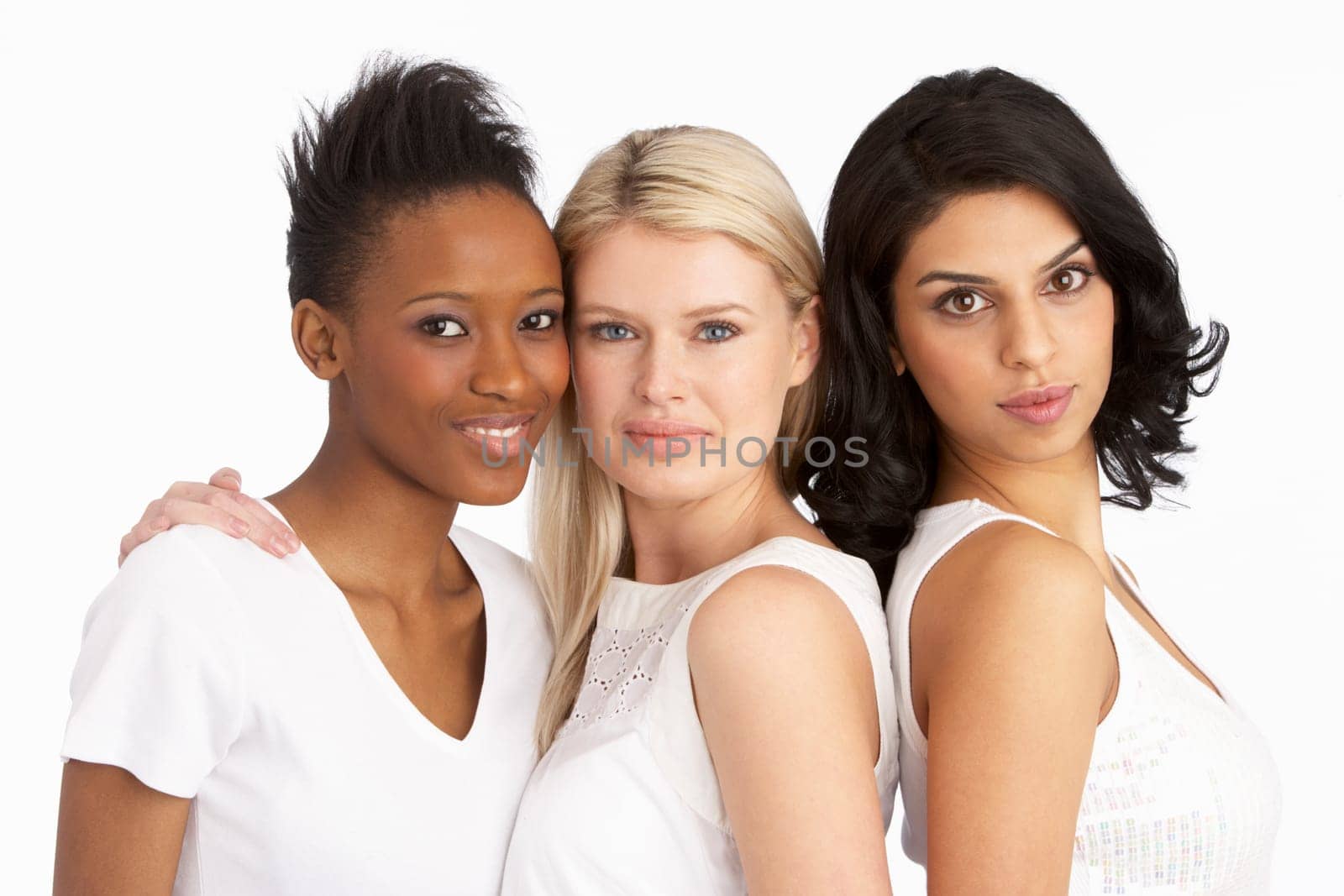 Portrait Of Three Attractive Young Women In Studio