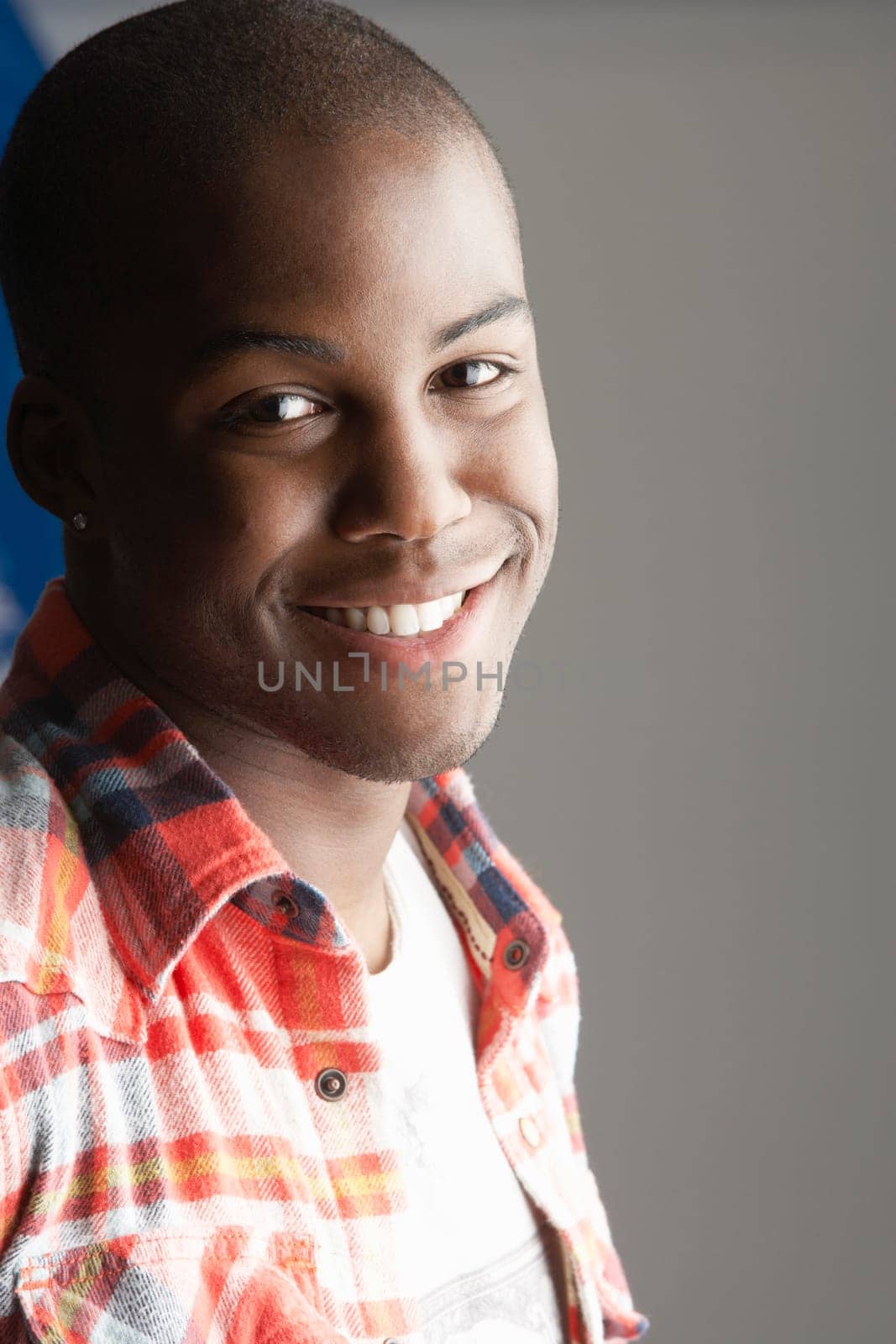 Fashionable Young Man Wearing Casual Clothes In Studio