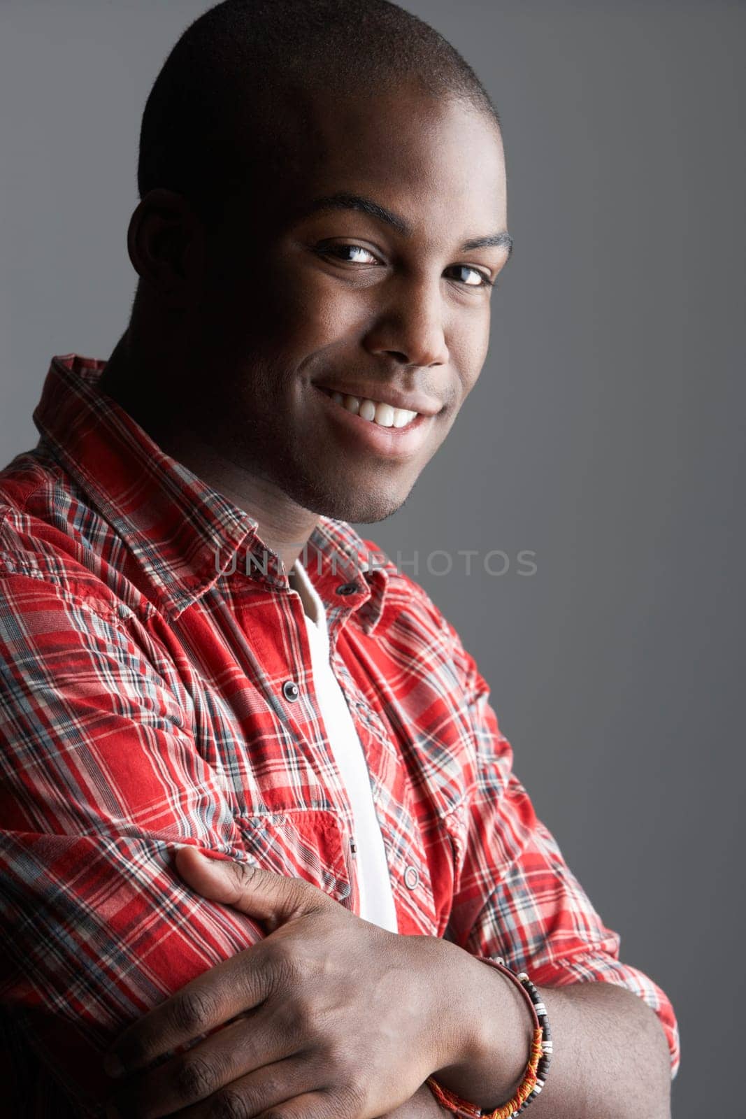 Fashionable Young Man Wearing Casual Clothes In Studio