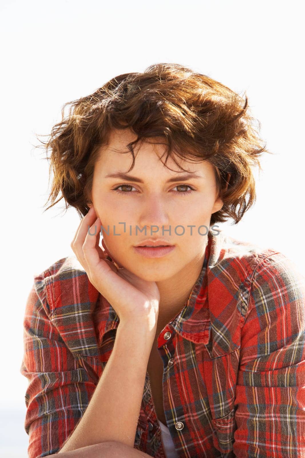 Young Woman Relaxing On Beach