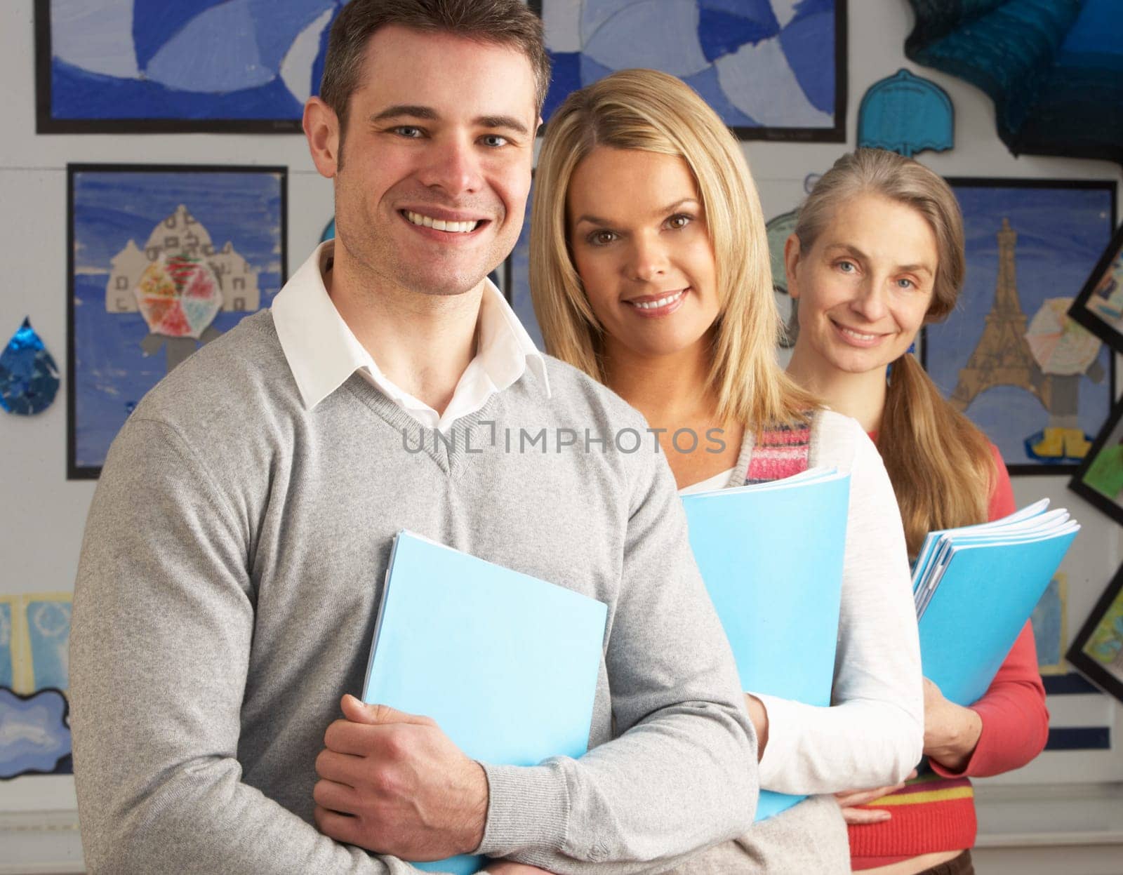 Portrait Of Group Of Teachers In Classroom