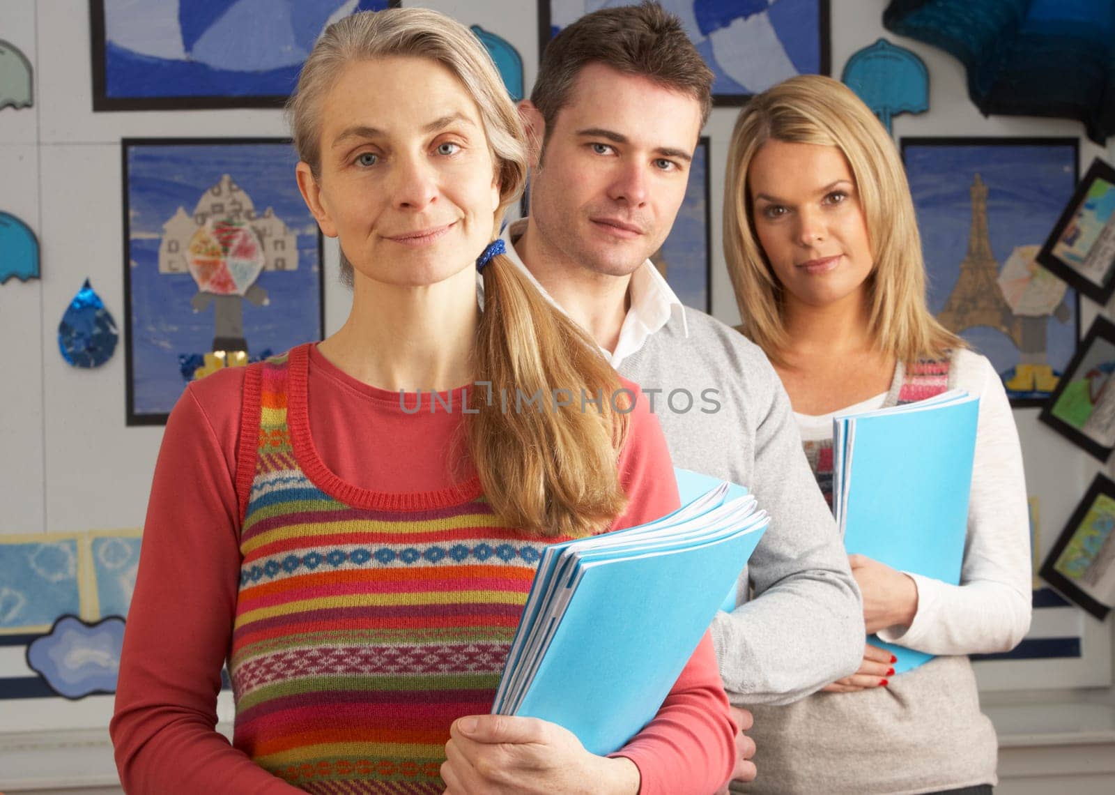 Portrait Of Group Of Teachers In Classroom