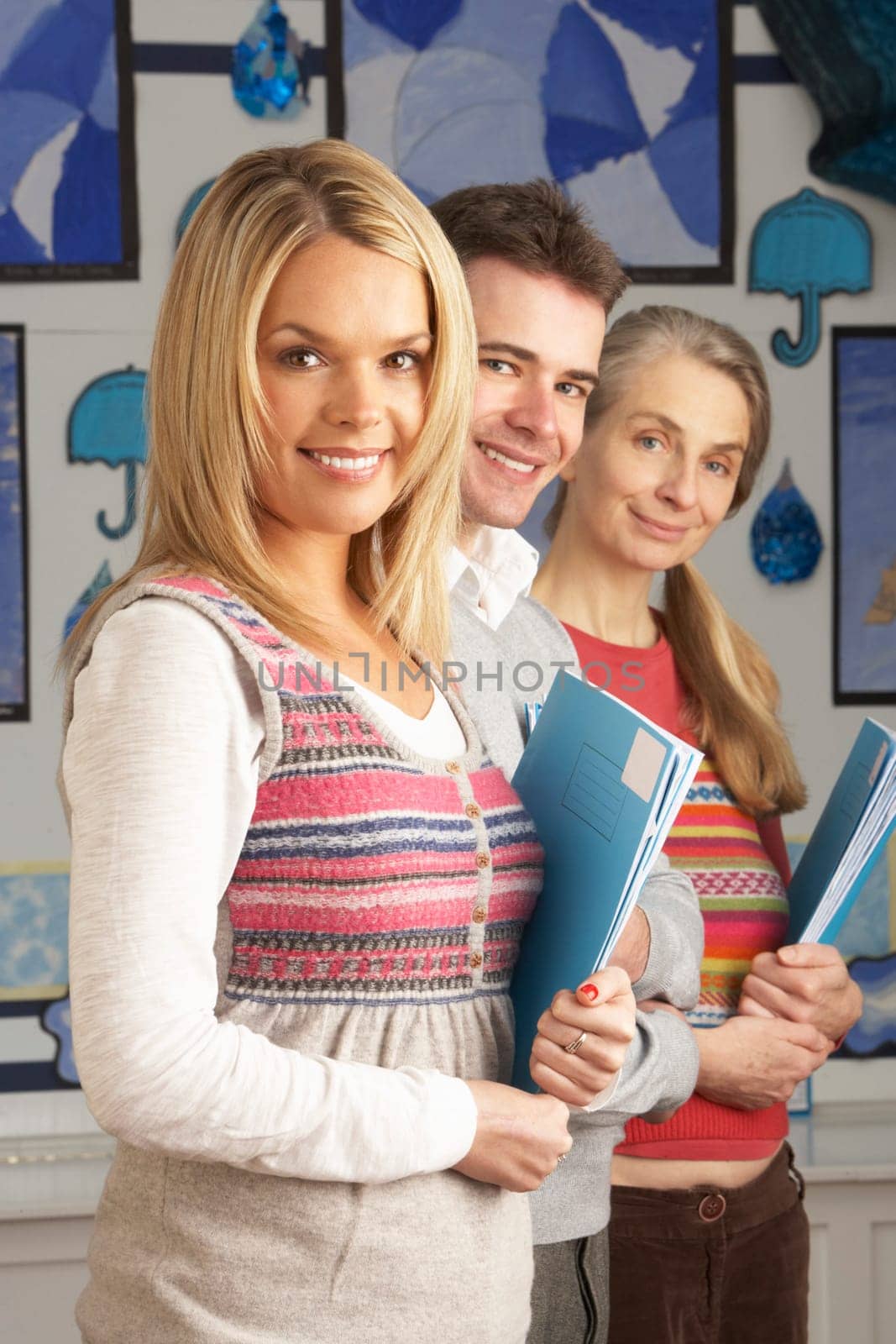 Portrait Of Group Of Teachers In Classroom