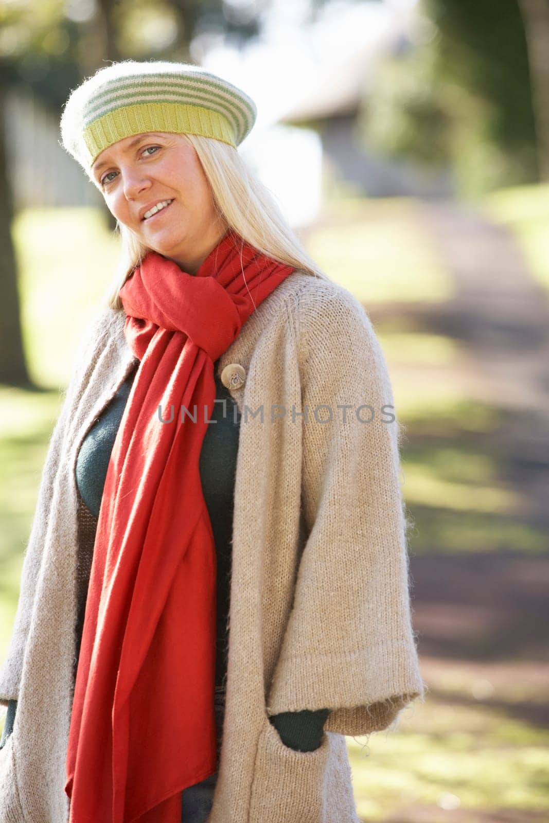 Portrait Of Woman Outdoors In Autumn Landscape
