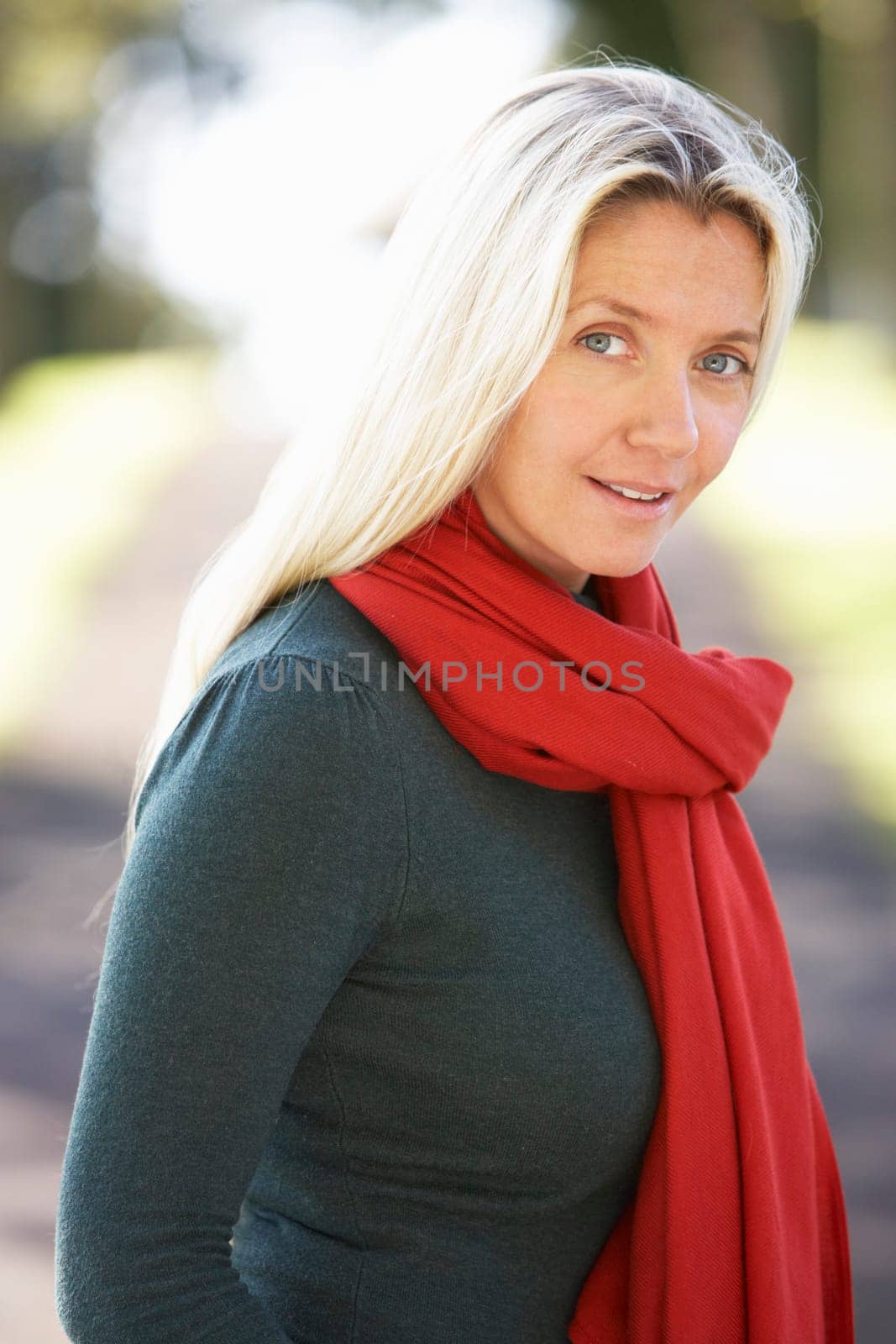 Portrait Of Woman Outdoors In Autumn Landscape