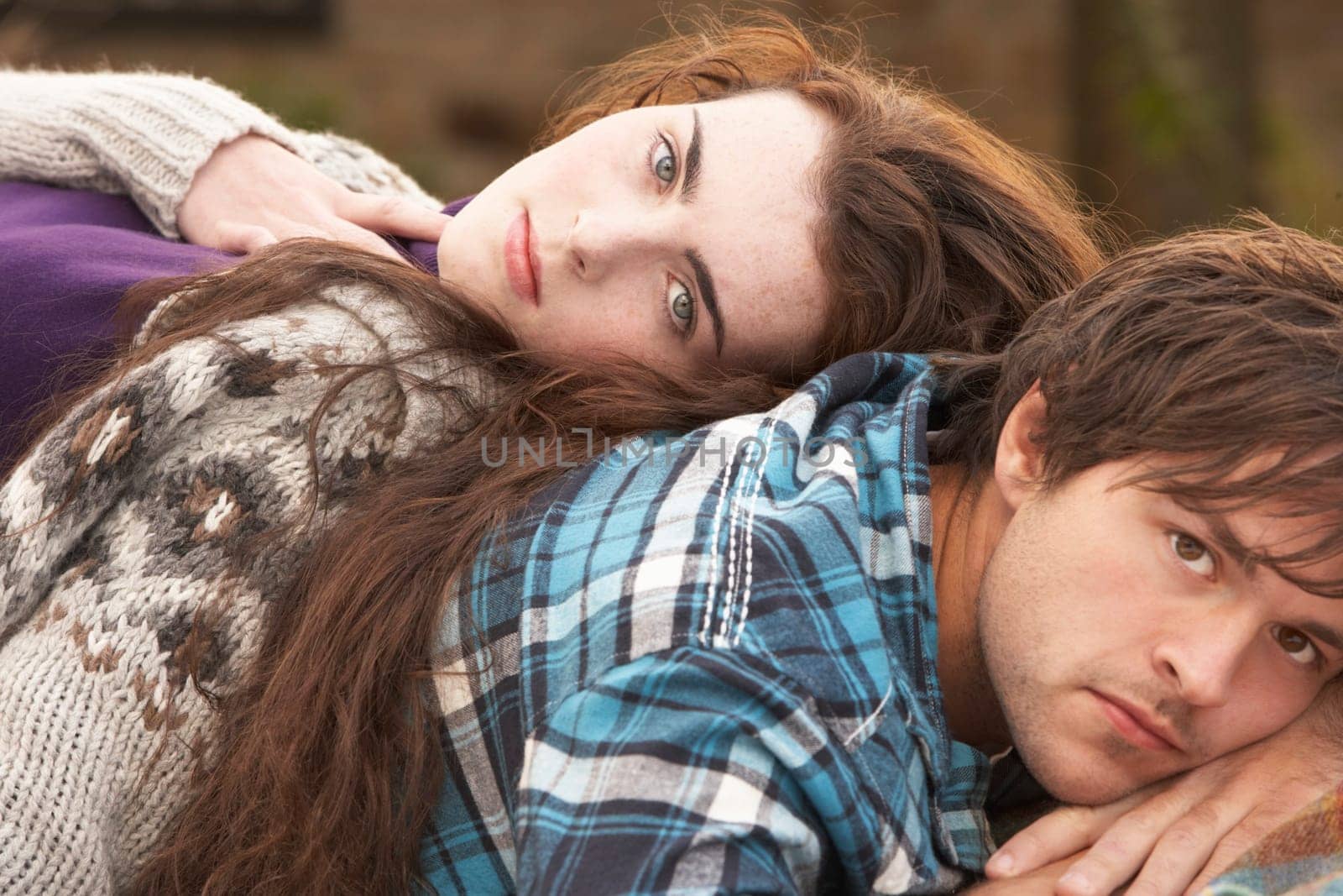 Portrait Of Romantic Young Couple In Autumn Landscape
