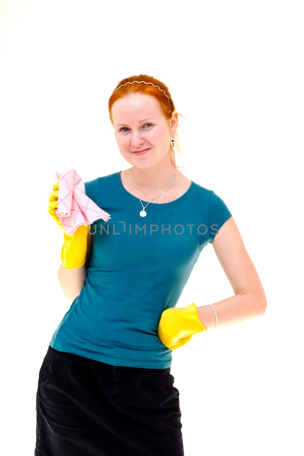 redhead young woman holding a rag