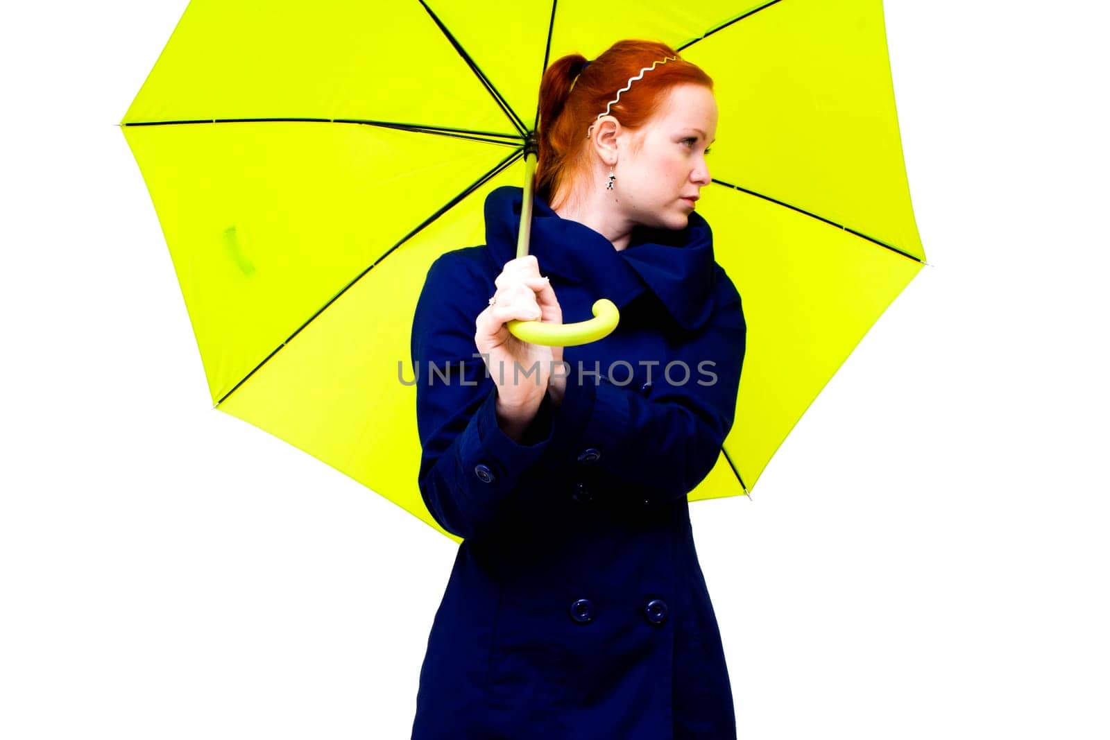 redhead young woman holding an  umbrella