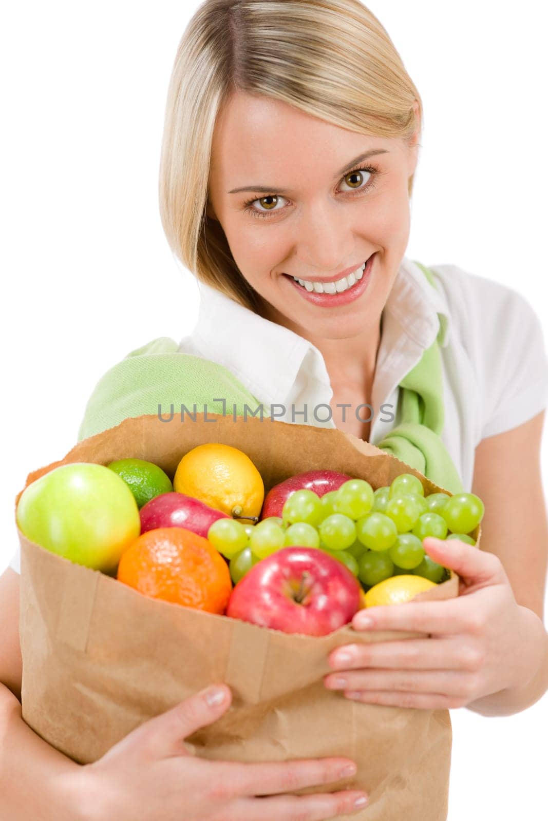 Healthy lifestyle - woman with fruit shopping paper bag