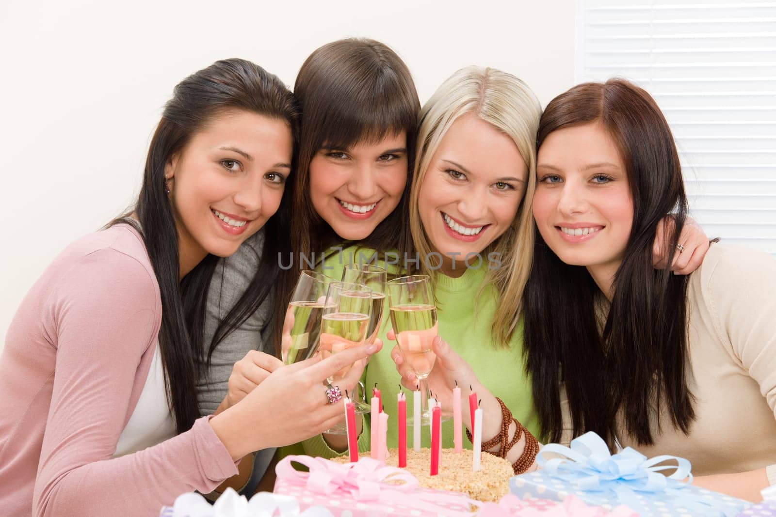 Birthday party - happy woman toast with champagne