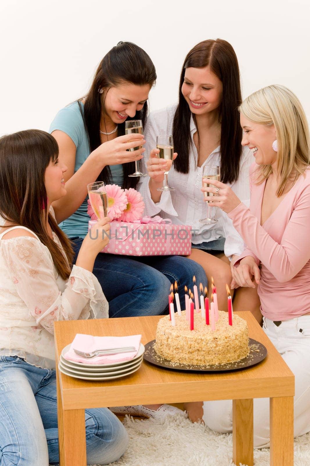 Birthday party - woman getting present and flower