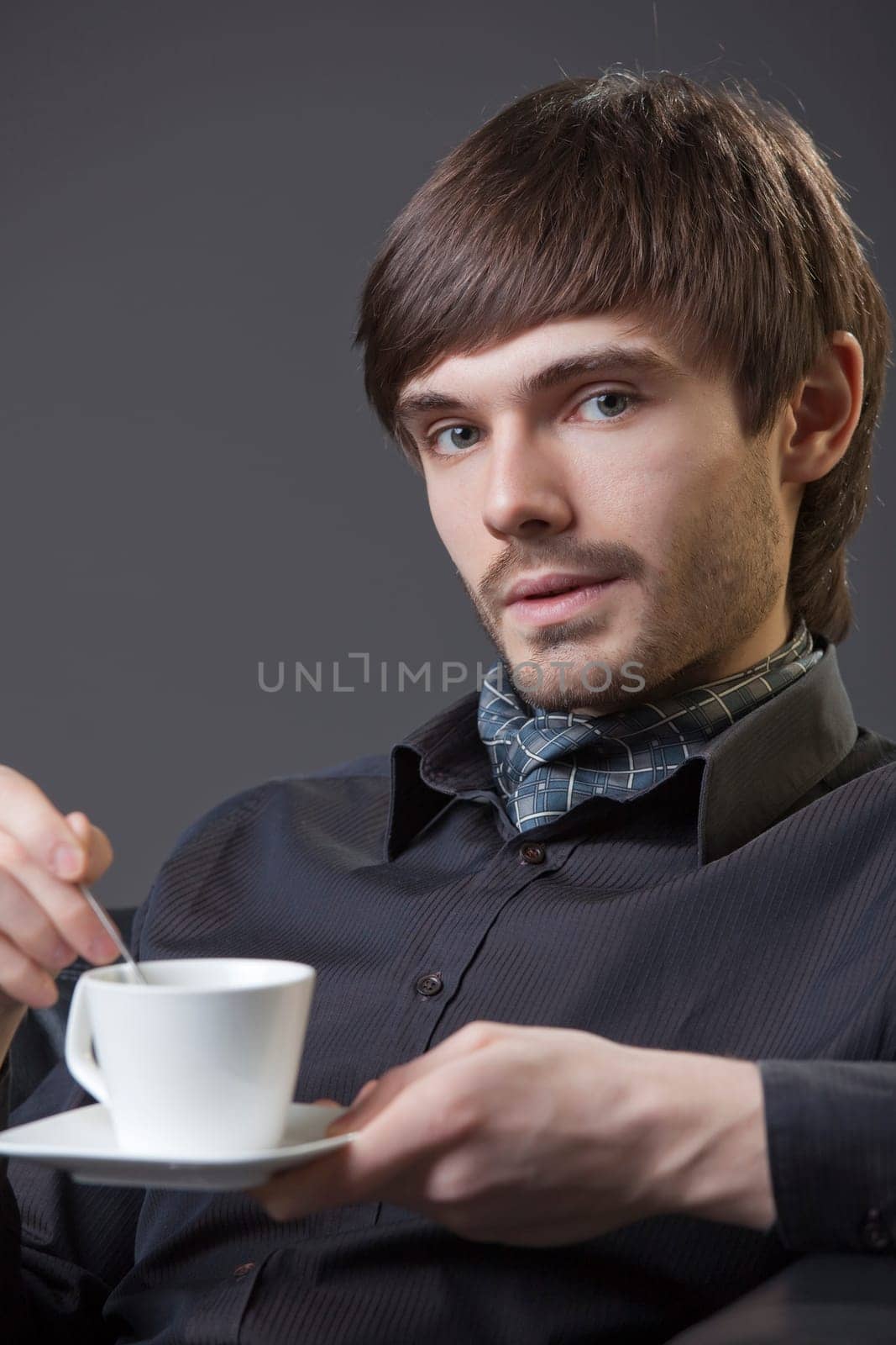 man with cup coffee