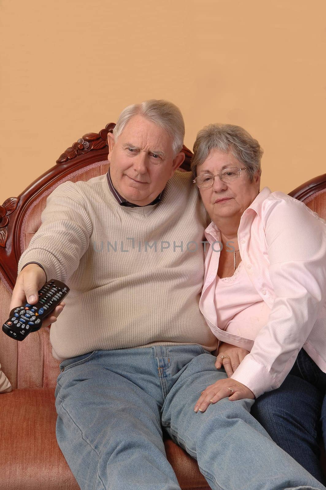 Seniors watching TV.