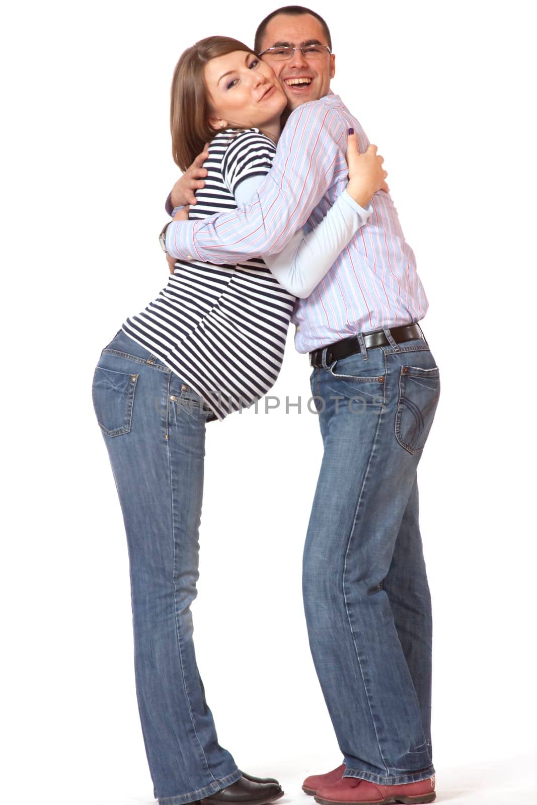 Happy young man and his pregnant wife