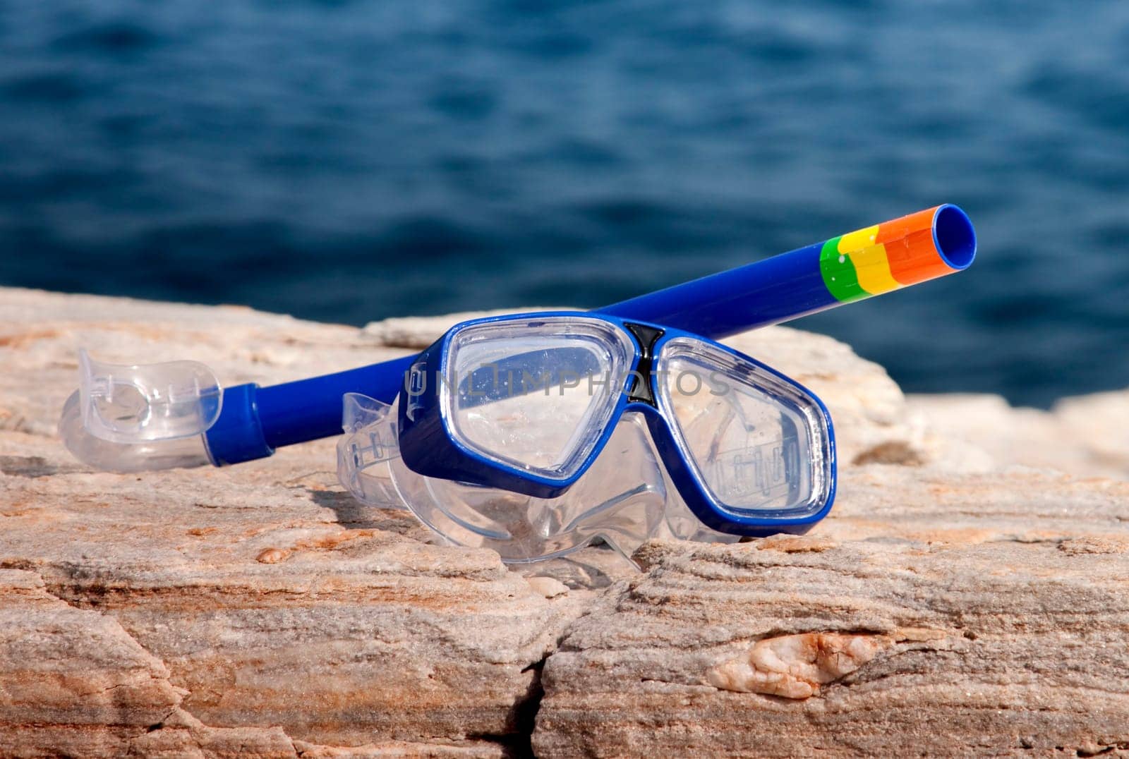 blue diving goggles with snorkel