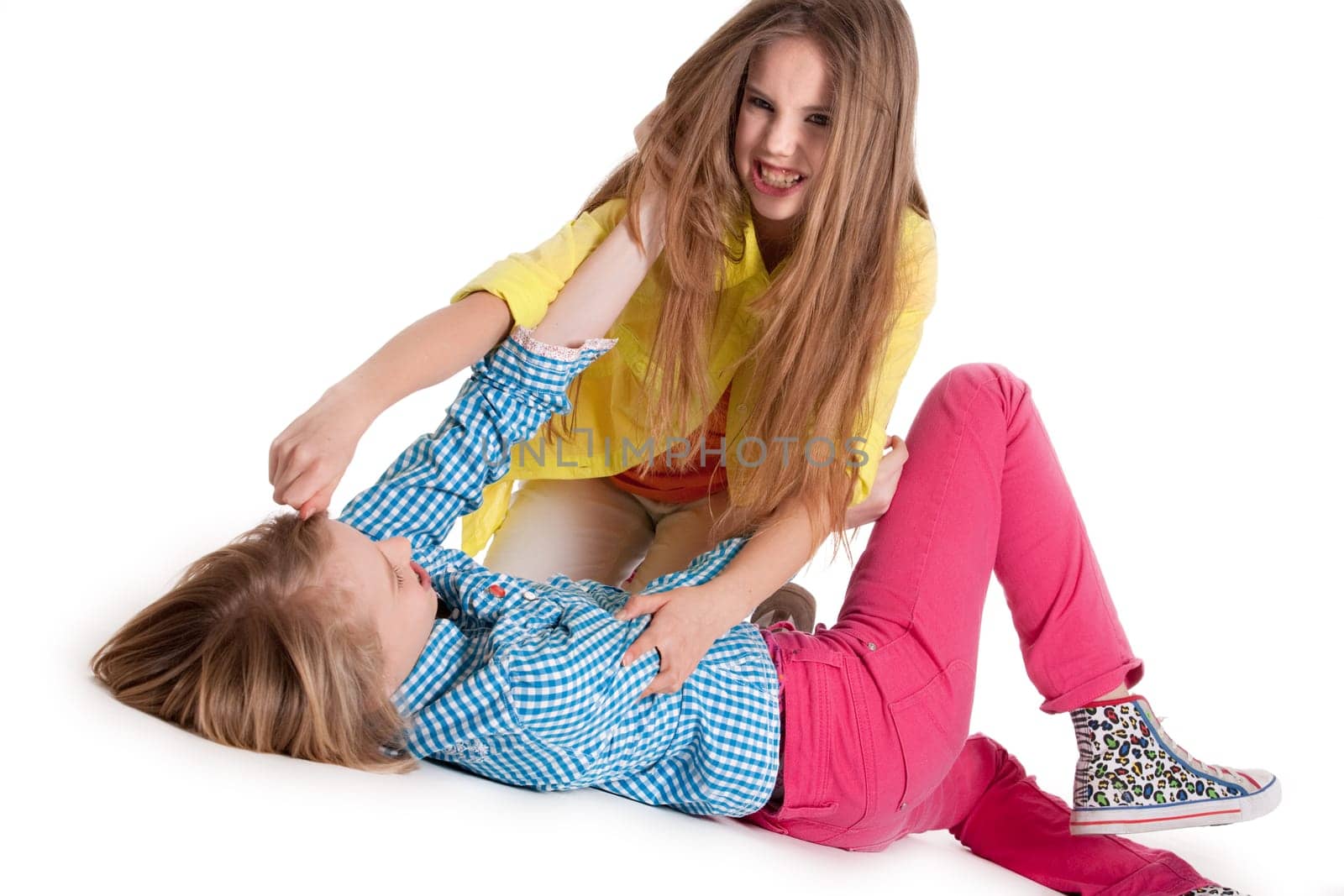 Happy girlfriends with colorfull clothes and a happy look