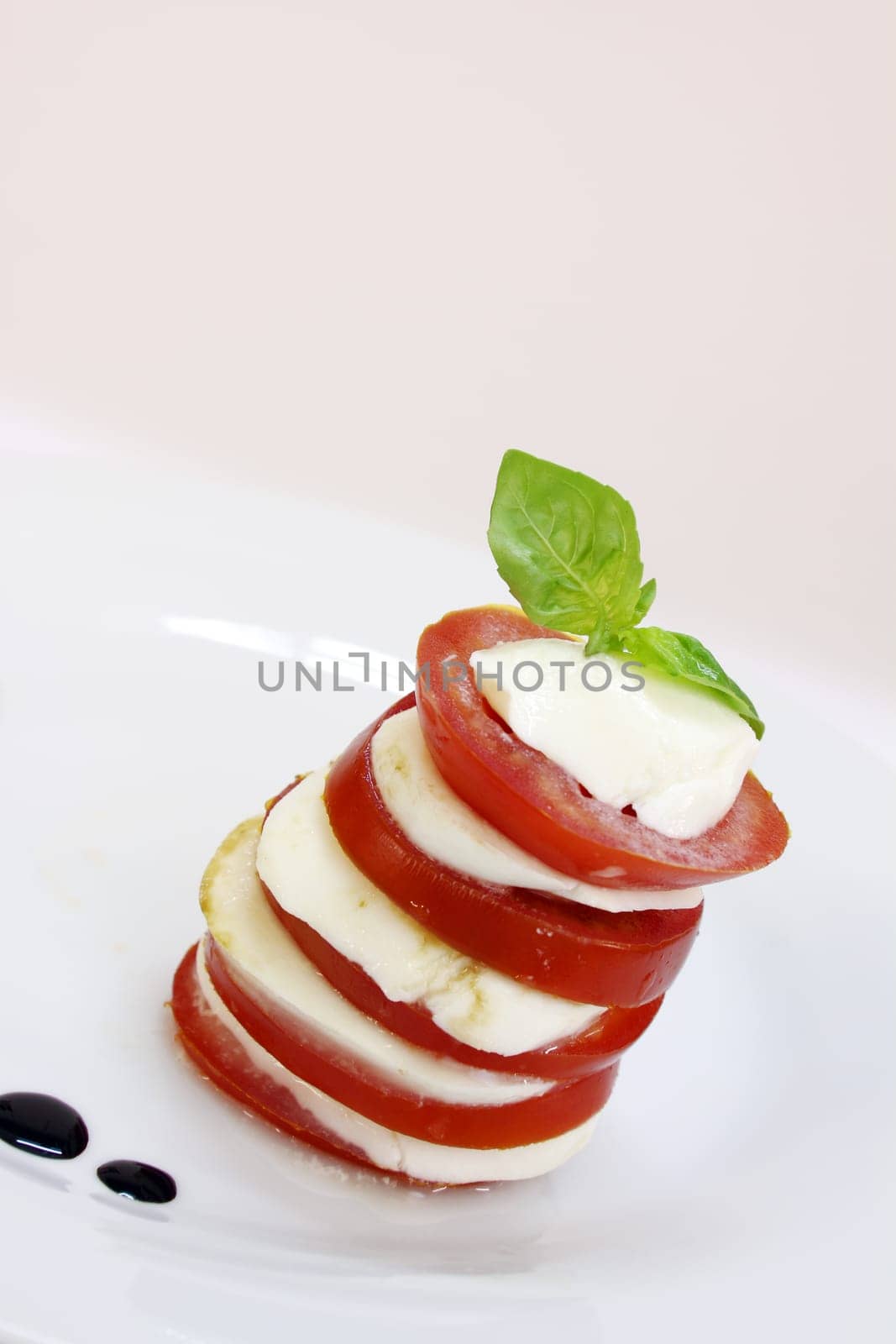 caprese - italian fresh appetizer (tomato, mozzarella, basil)
