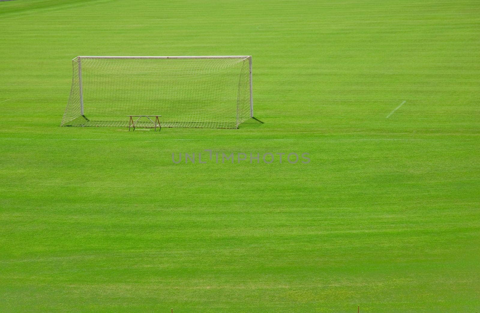 Detail shot of a goal in a football field.