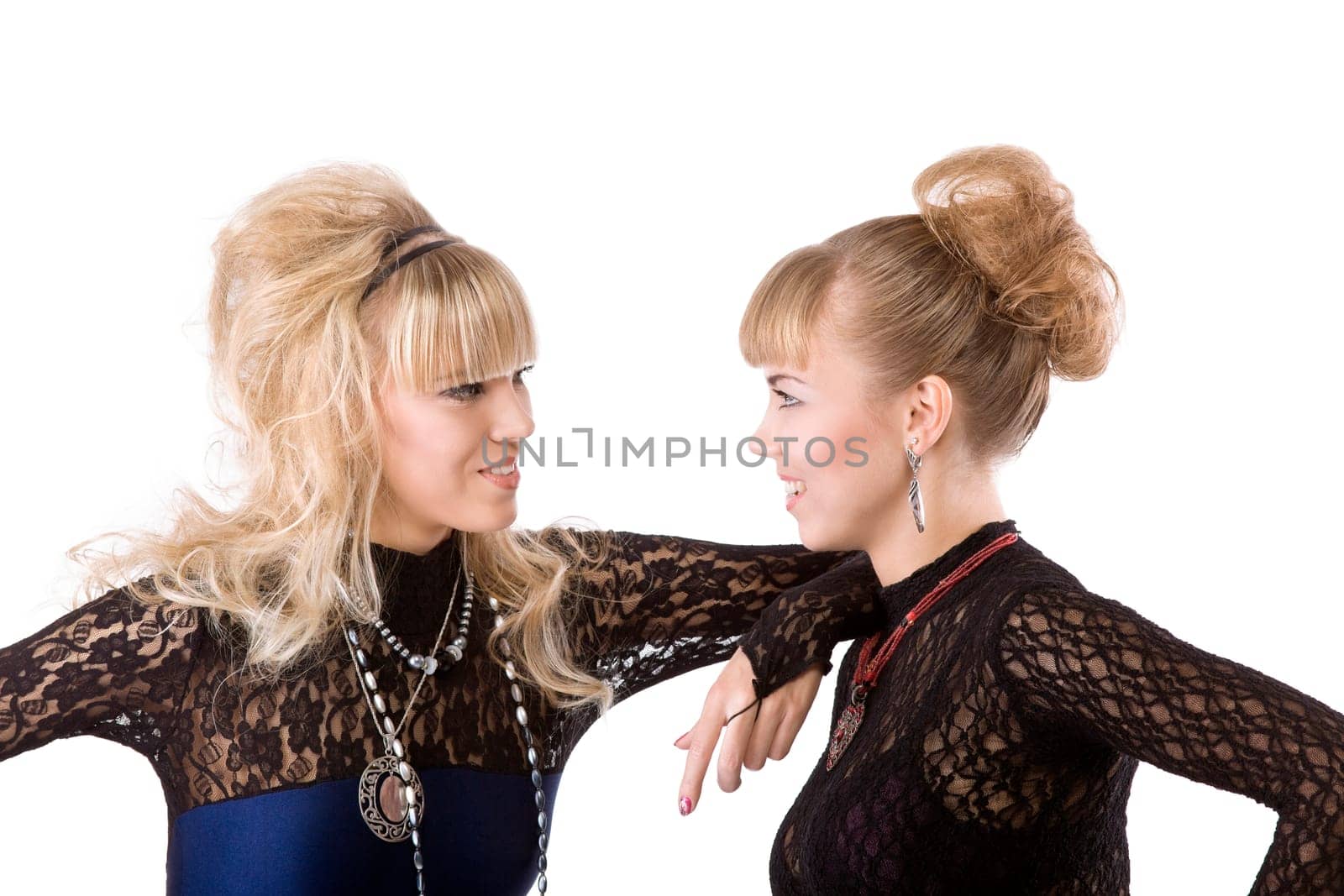 two pretty girl in lace talk and smile