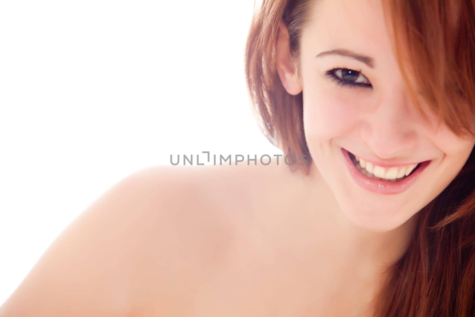 Beautiful brunette girl isolated in the studio