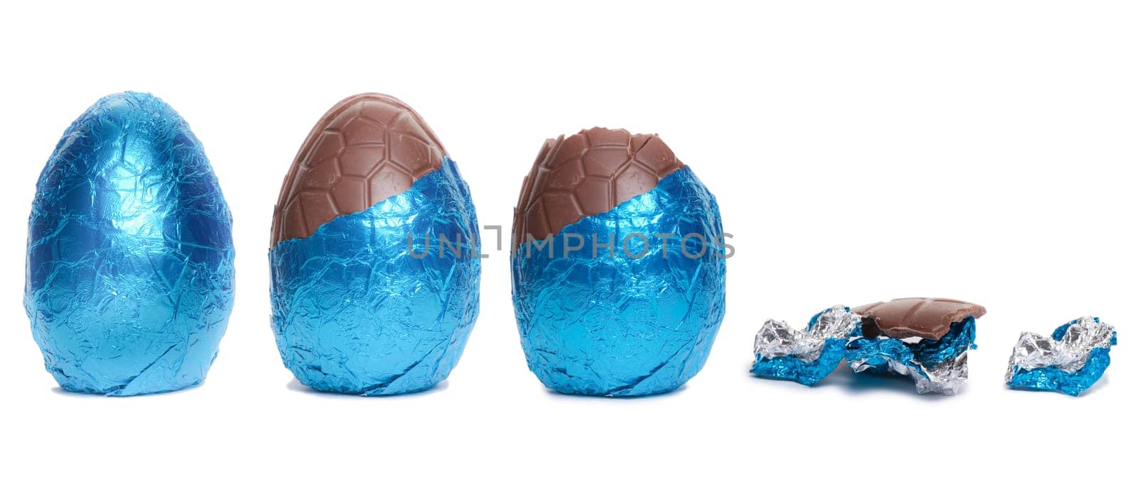 The lifecycle in stages of a Blue Foil covered chocolate easter egg isolated against white background.