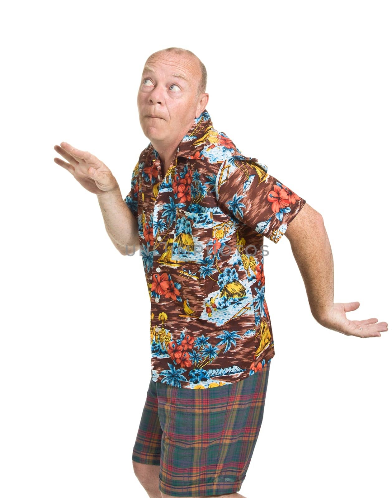 Expressive old man in loud shirt holiday concept isolated against white.