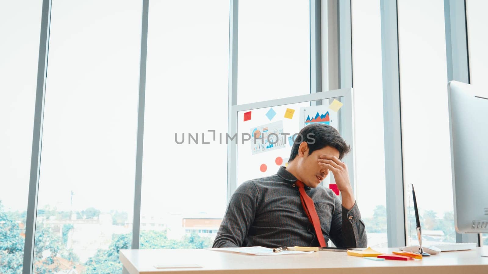 Unhappy business people dispute work problem at office . Business bankrupt failure and loss concept . Jivy