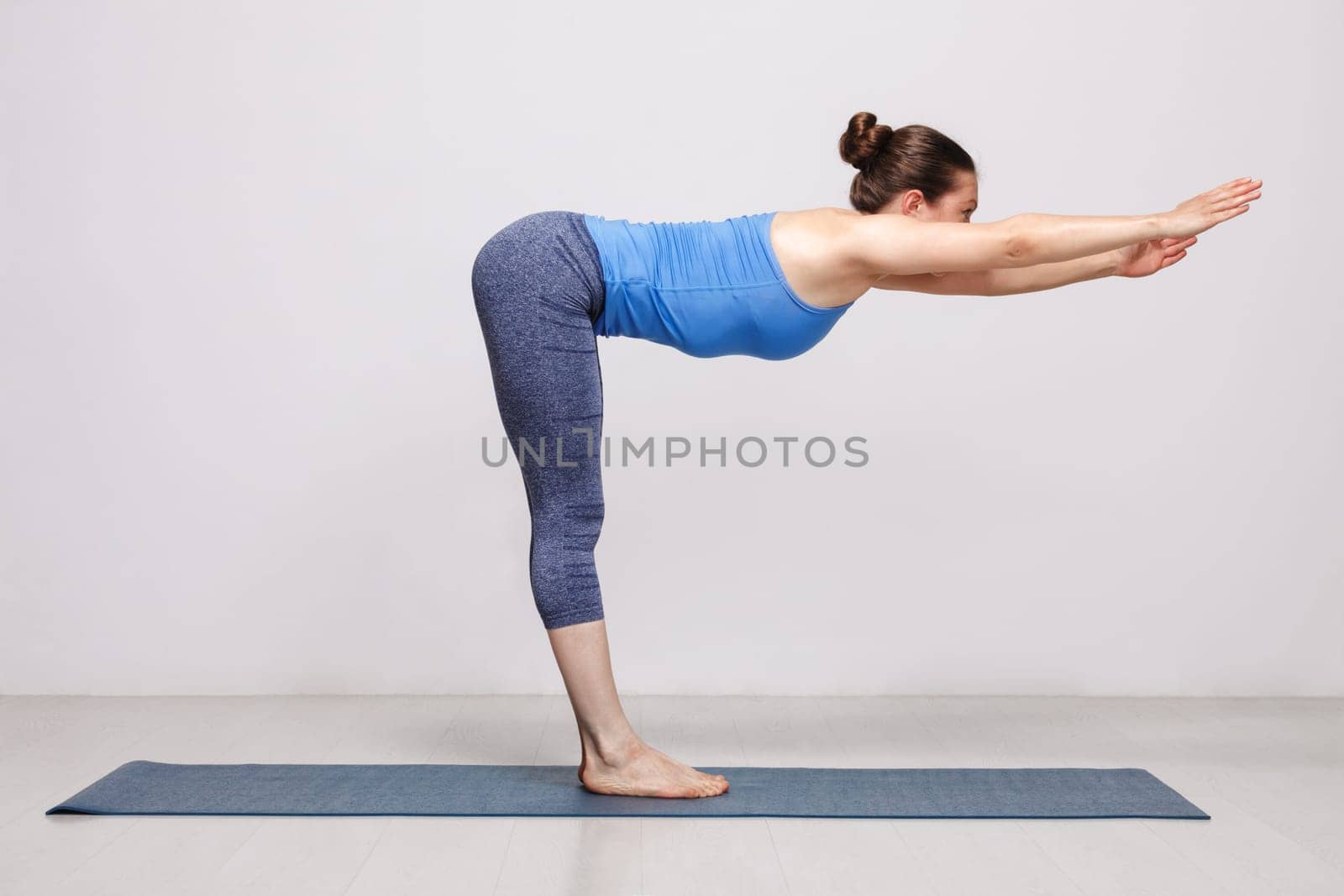 Woman doing yoga by dimol