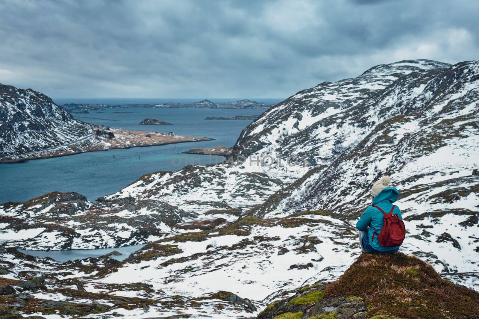 Woman tourist on Lofoten islands, Norway by dimol