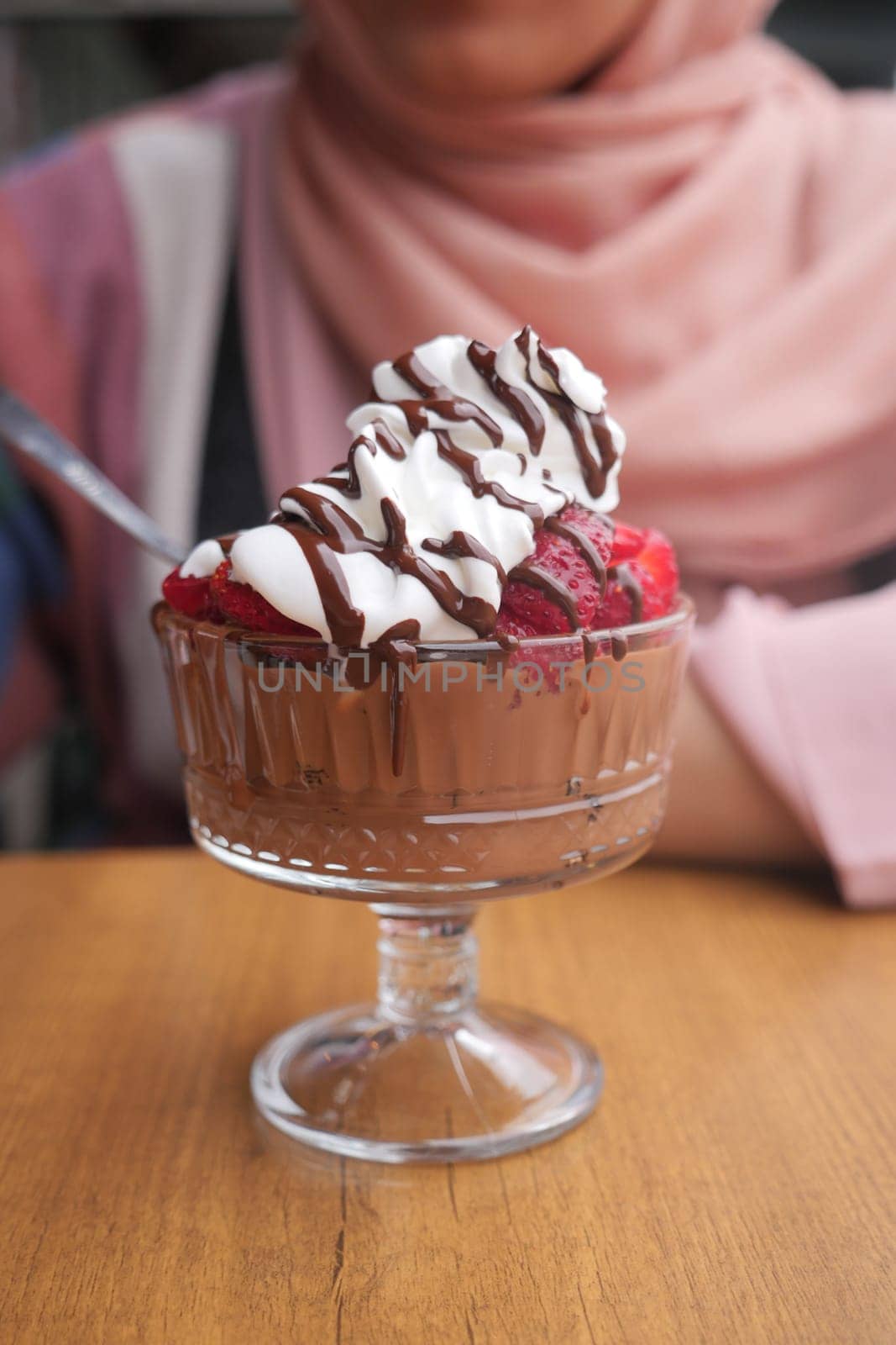 eating Strawberry chocolate Ice Cream